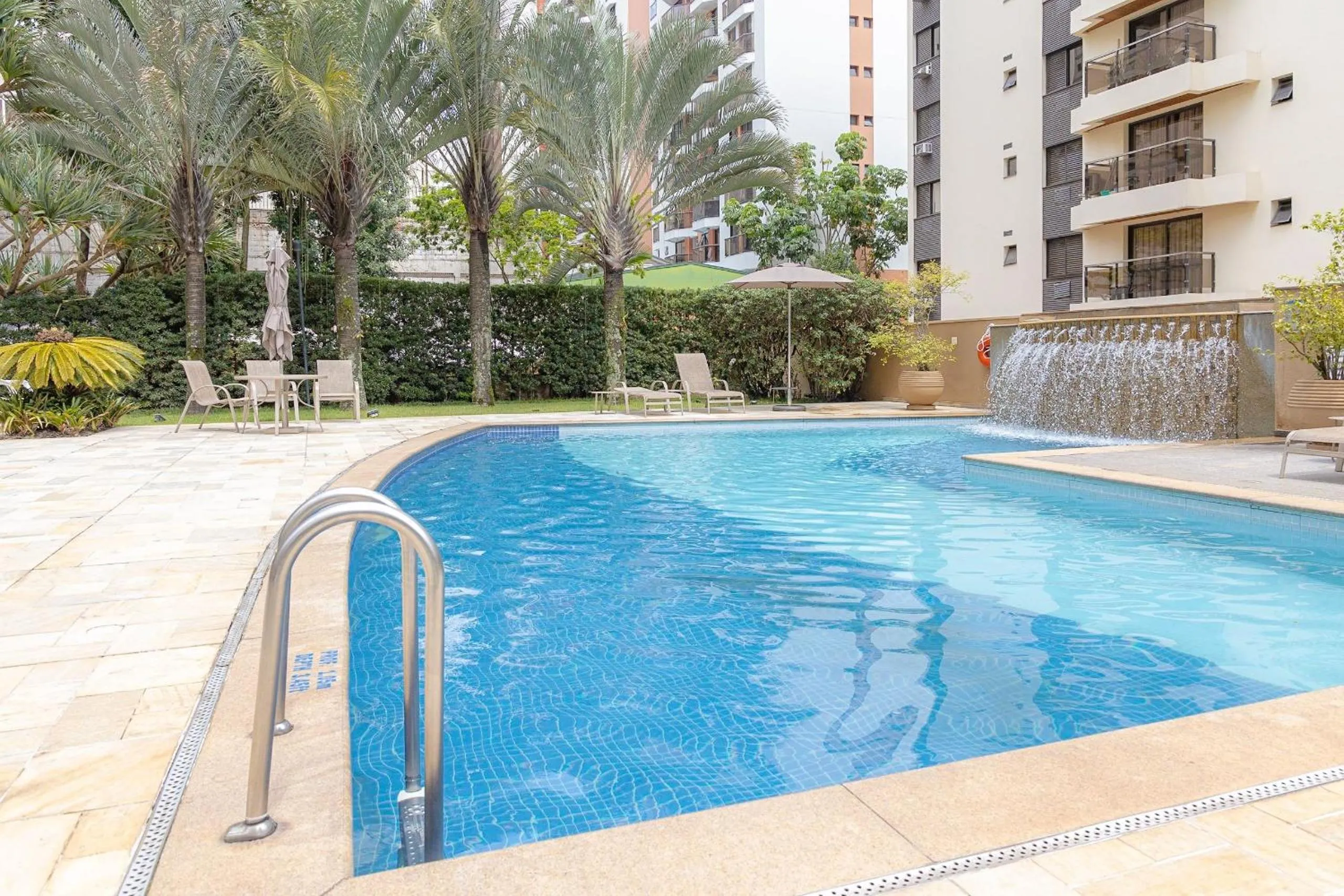 Pool view in Elegant Flat Internacional Plaza-Garagem e Piscina
