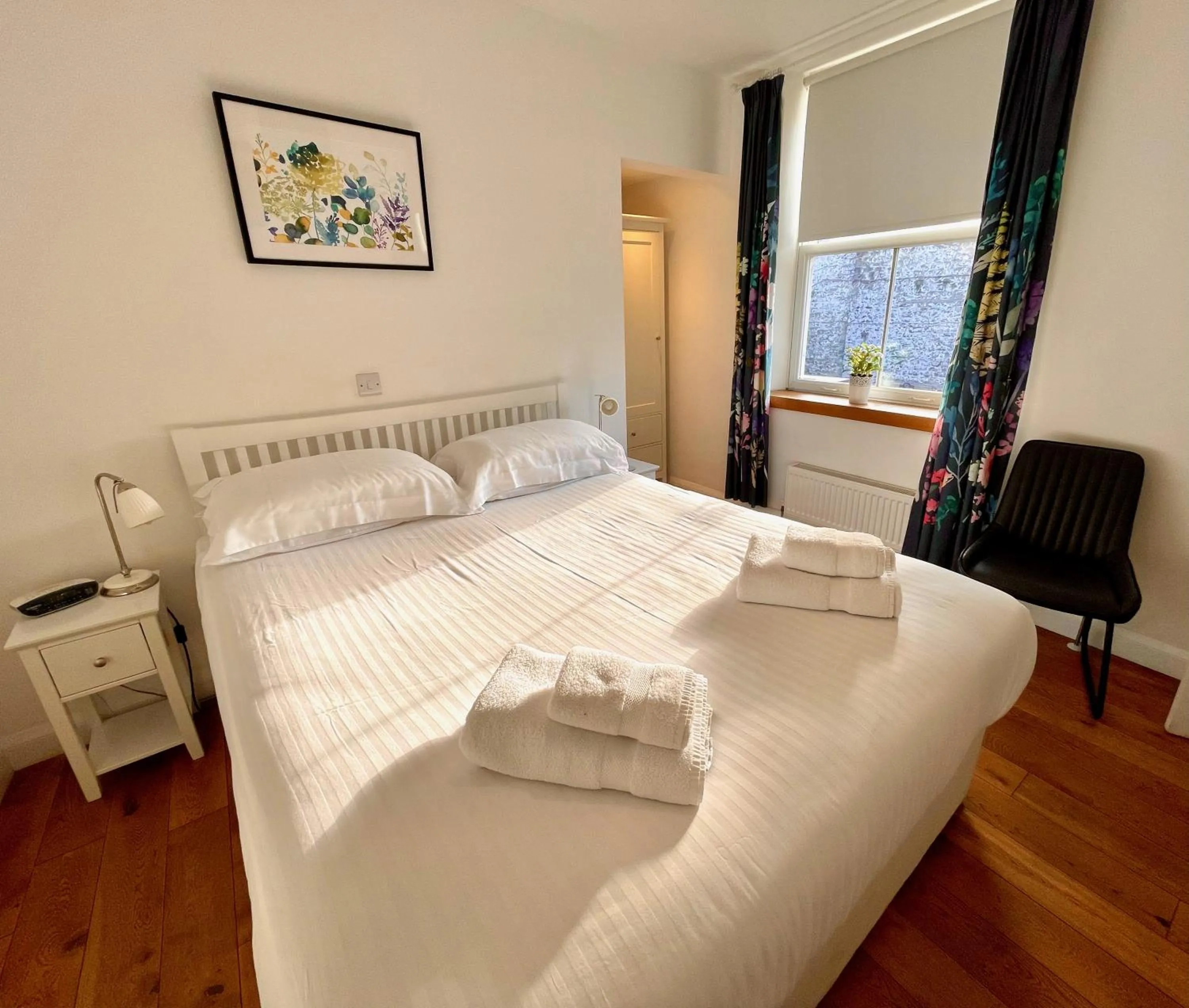 Bed in The Queen's Head Hotel