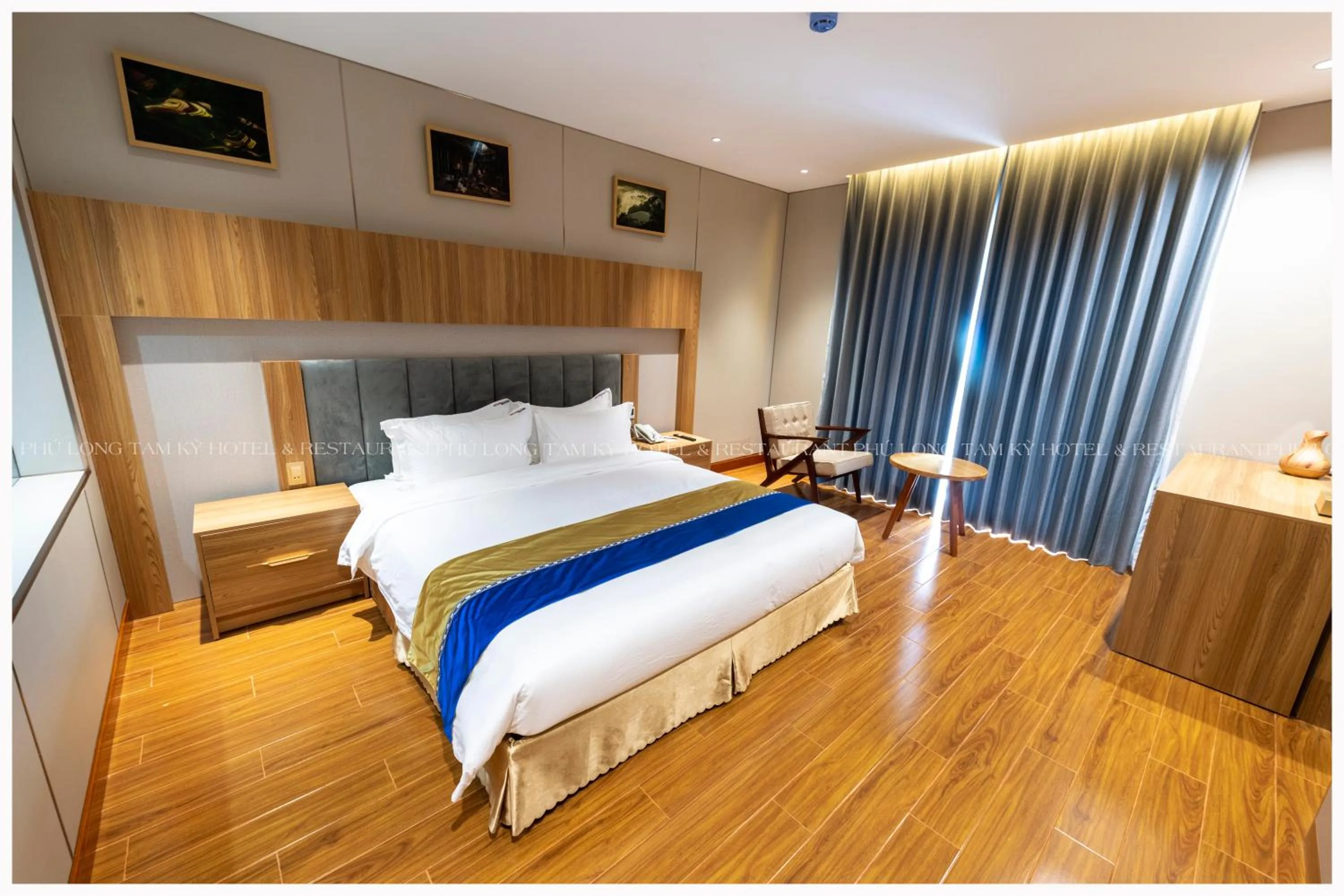 Photo of the whole room, Bed in Phú Long Tam Kỳ Hotel & Restaurant