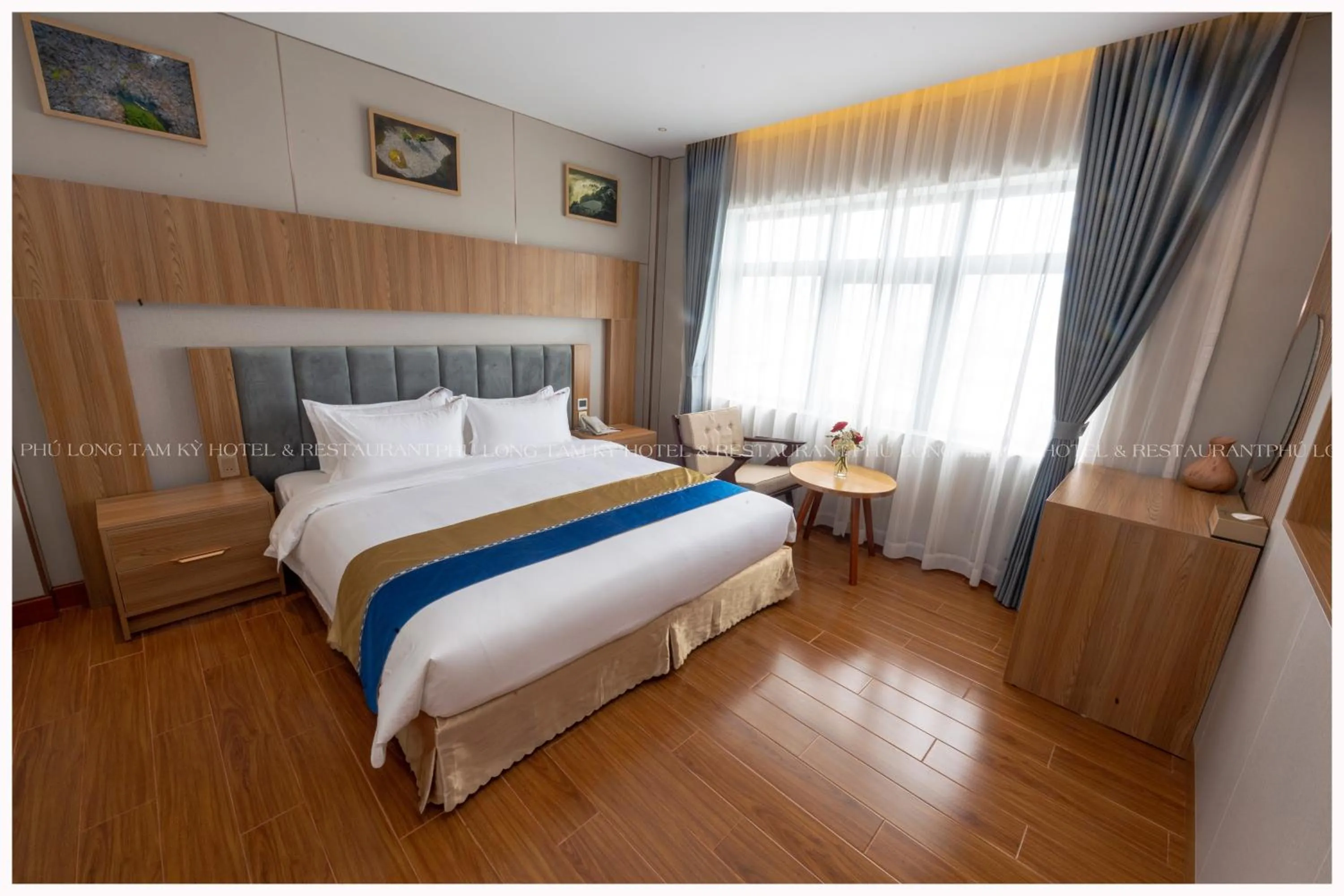 Photo of the whole room, Bed in Phú Long Tam Kỳ Hotel & Restaurant