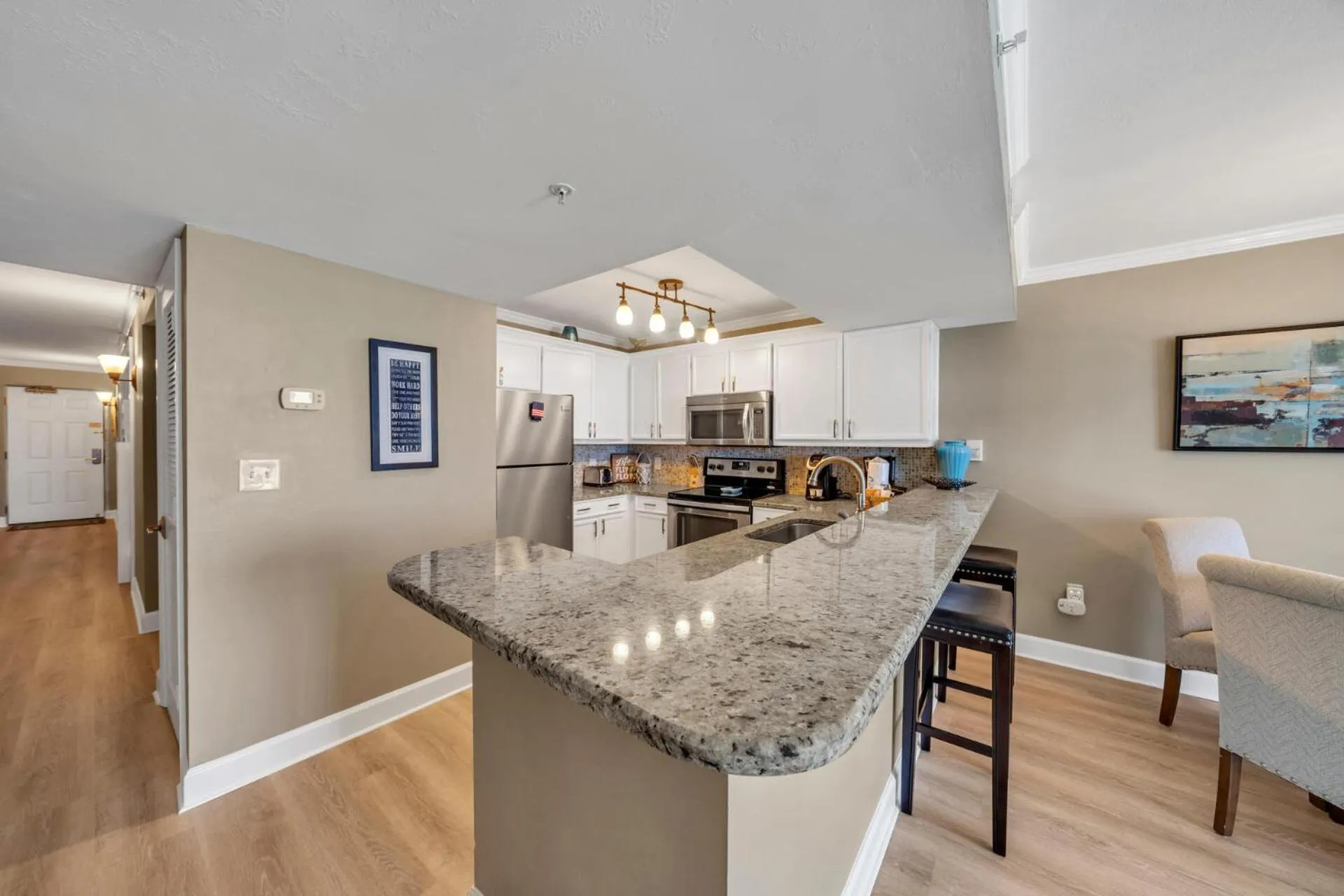 Kitchen or kitchenette in Pelican Beach Resort by Colasan