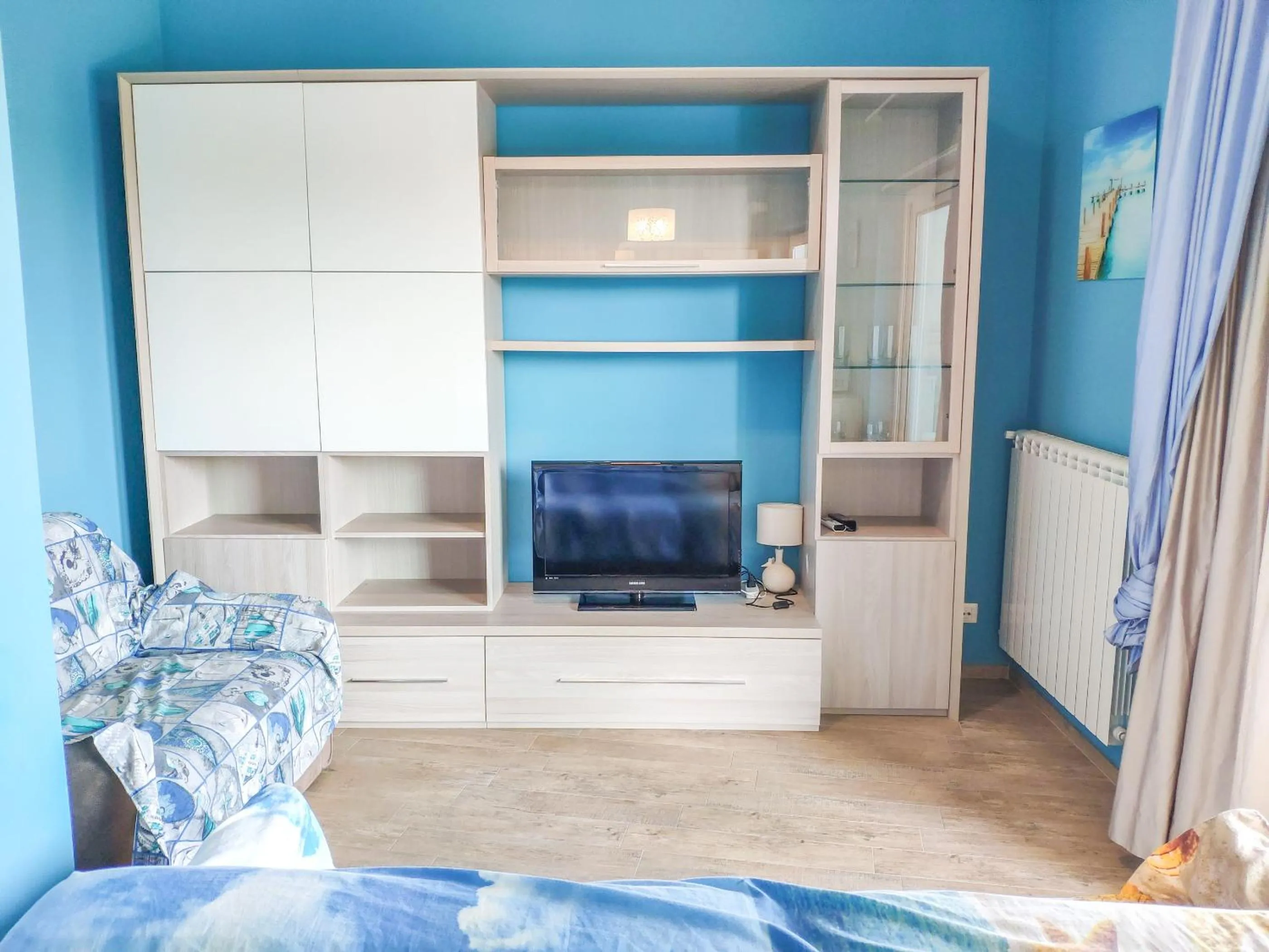 Living room, Bed in Homiday - Residence Mykonos