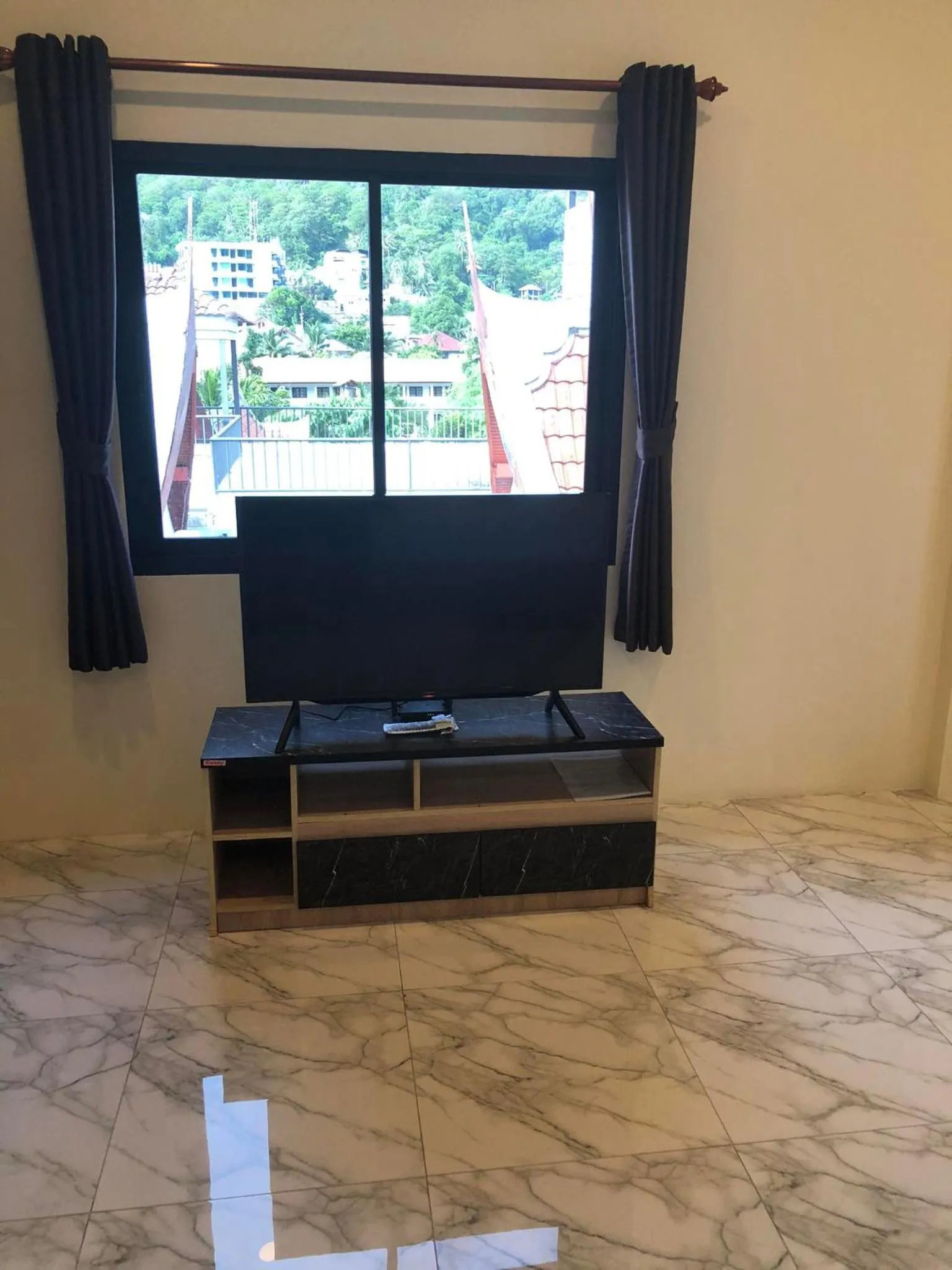 TV and multimedia in M&N Guesthouse Kata