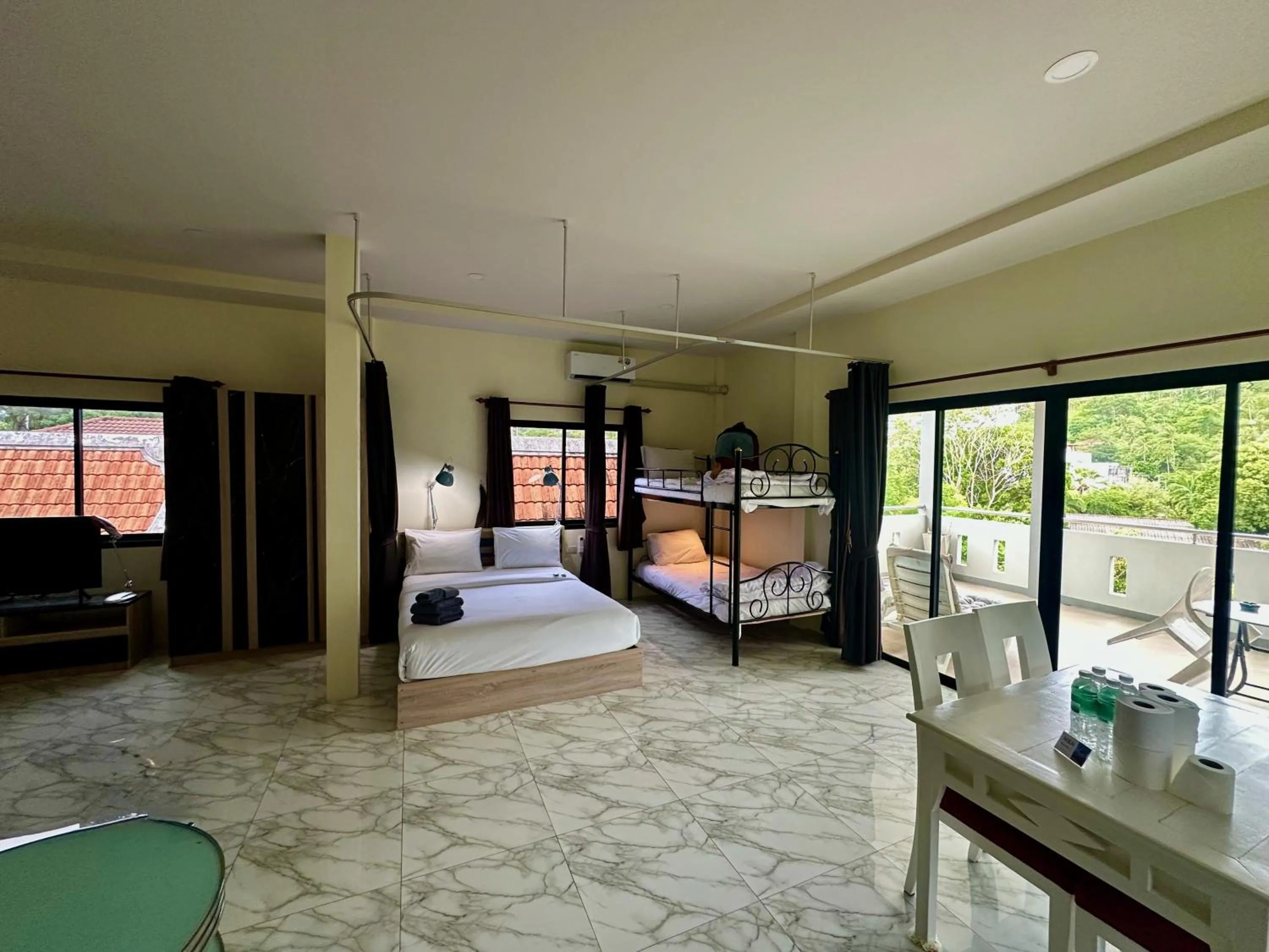 Bed in M&N Guesthouse Kata