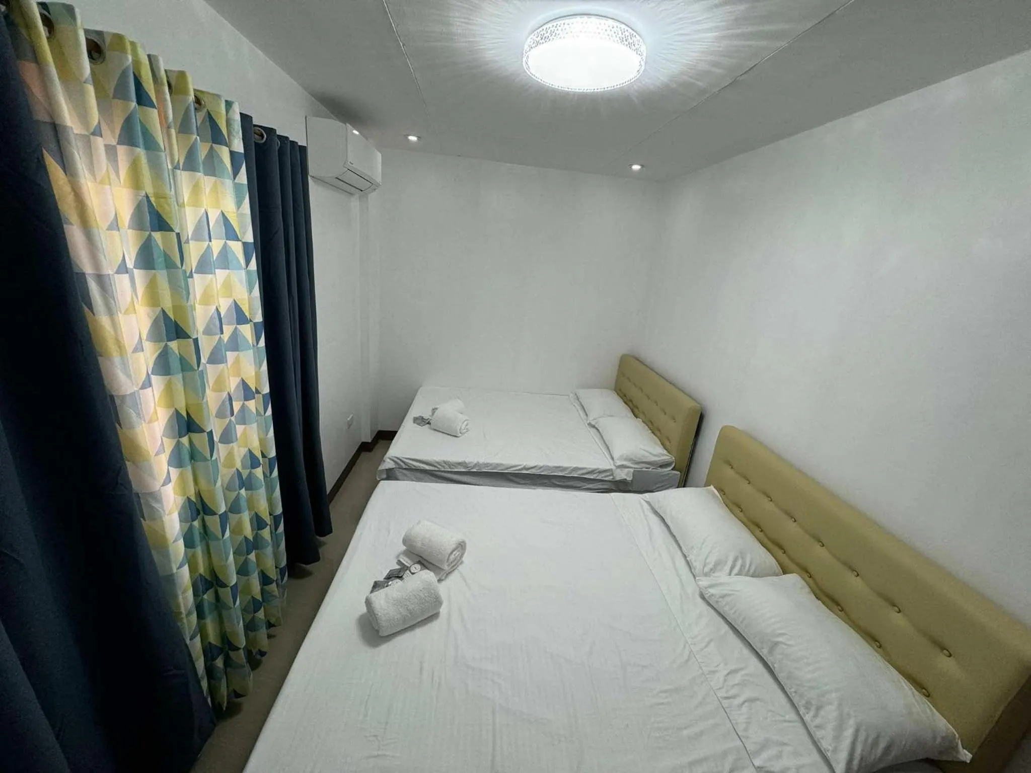 Photo of the whole room, Bed in JP Suites & Residences