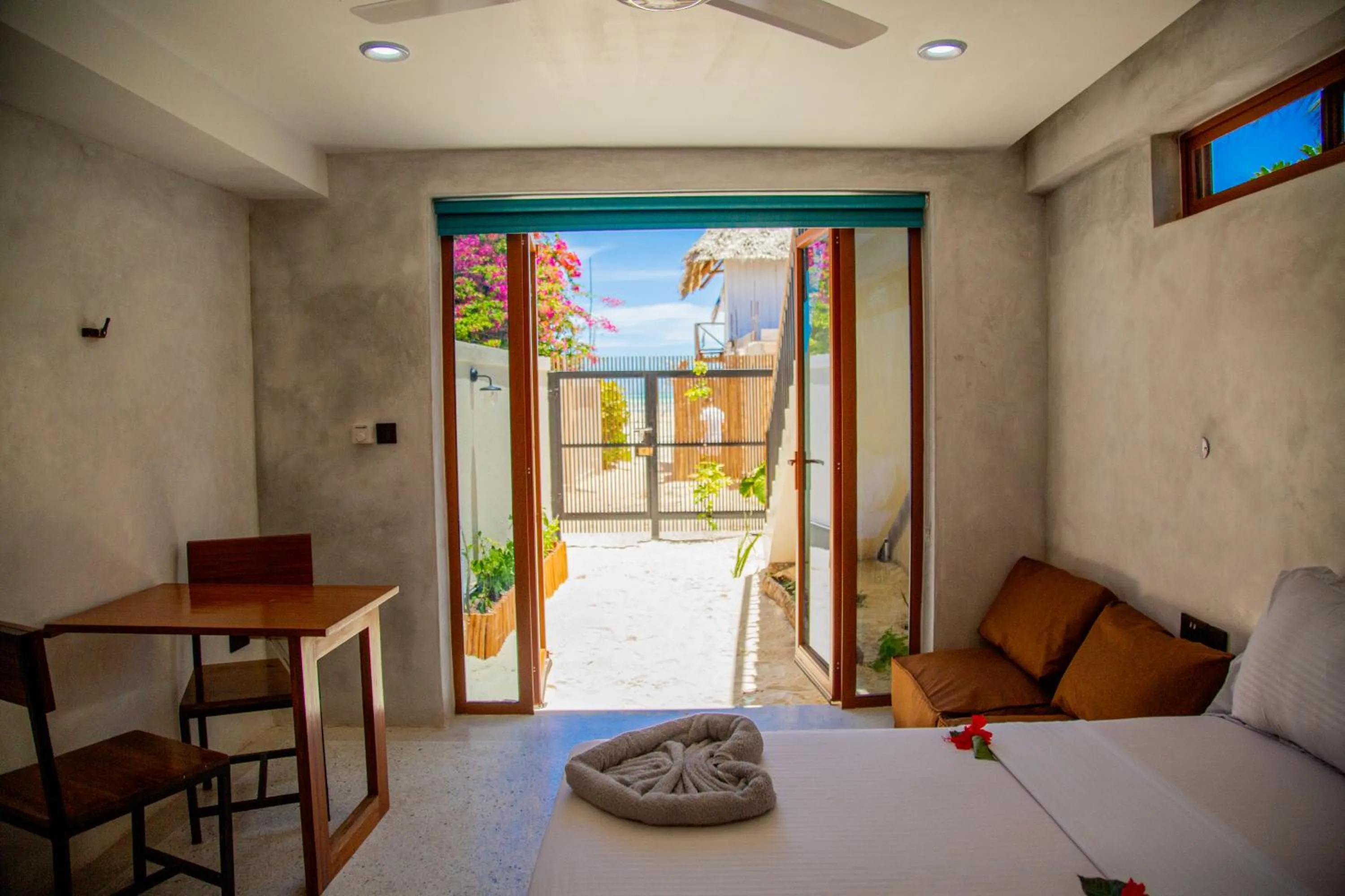 Living room, Bed in Pamoja Beach Stays Hotel in Jambiani