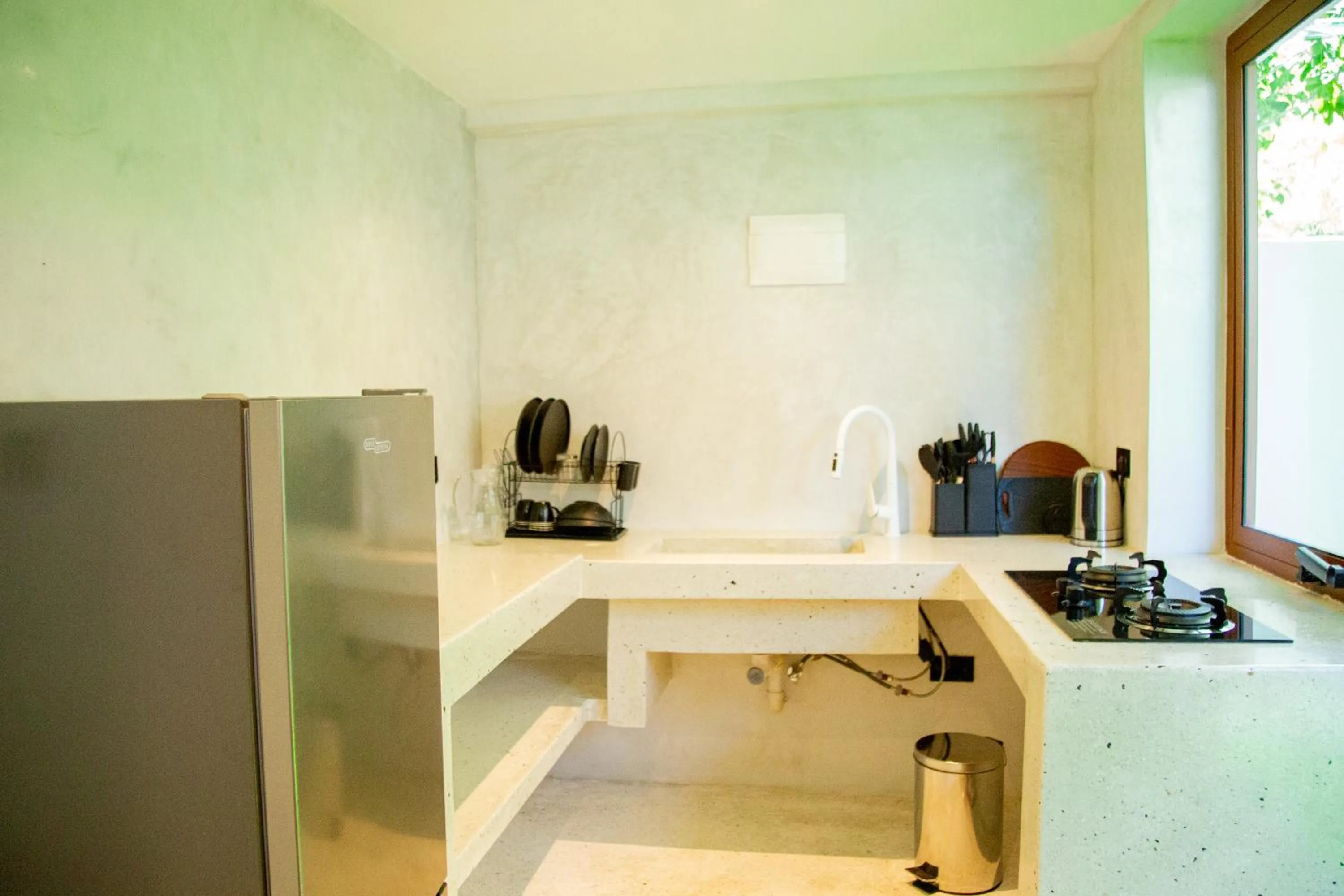 Kitchen or kitchenette in Pamoja Beach Stays Hotel in Jambiani