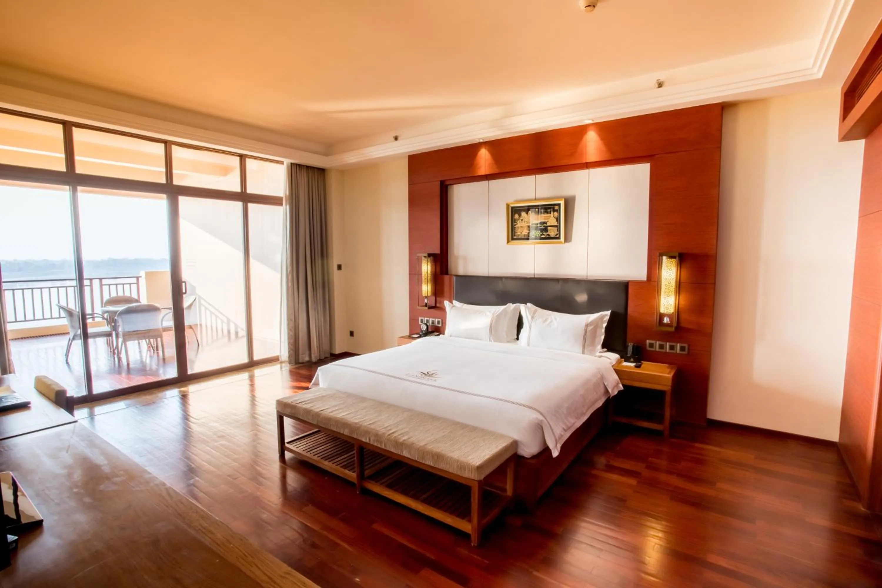 Bed in Landmark Mekong Riverside Hotel