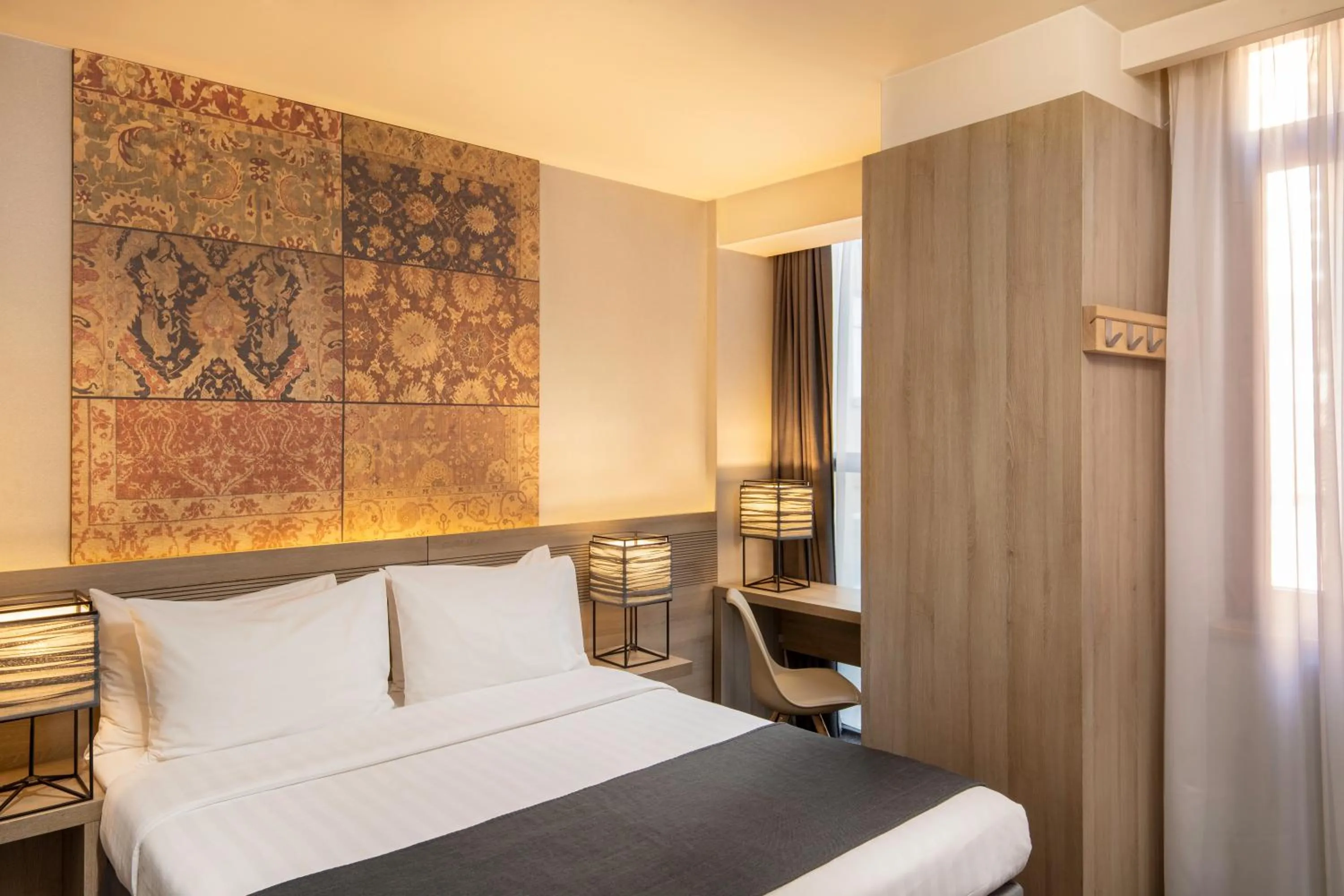 Bed in Republica Hotel Yerevan