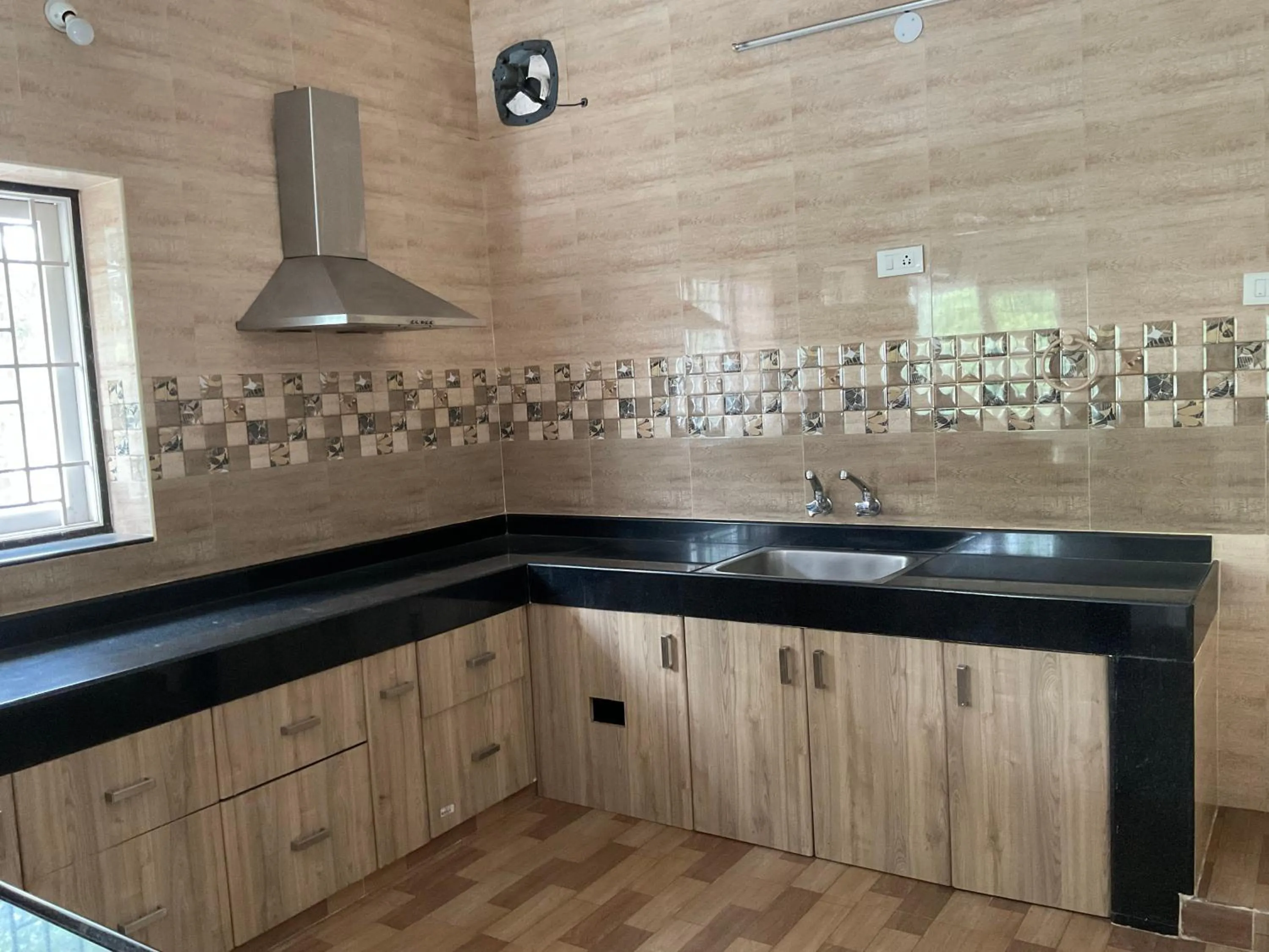 Kitchen or kitchenette in Shantham Service Apartments, Indumanagar, Coimbatore