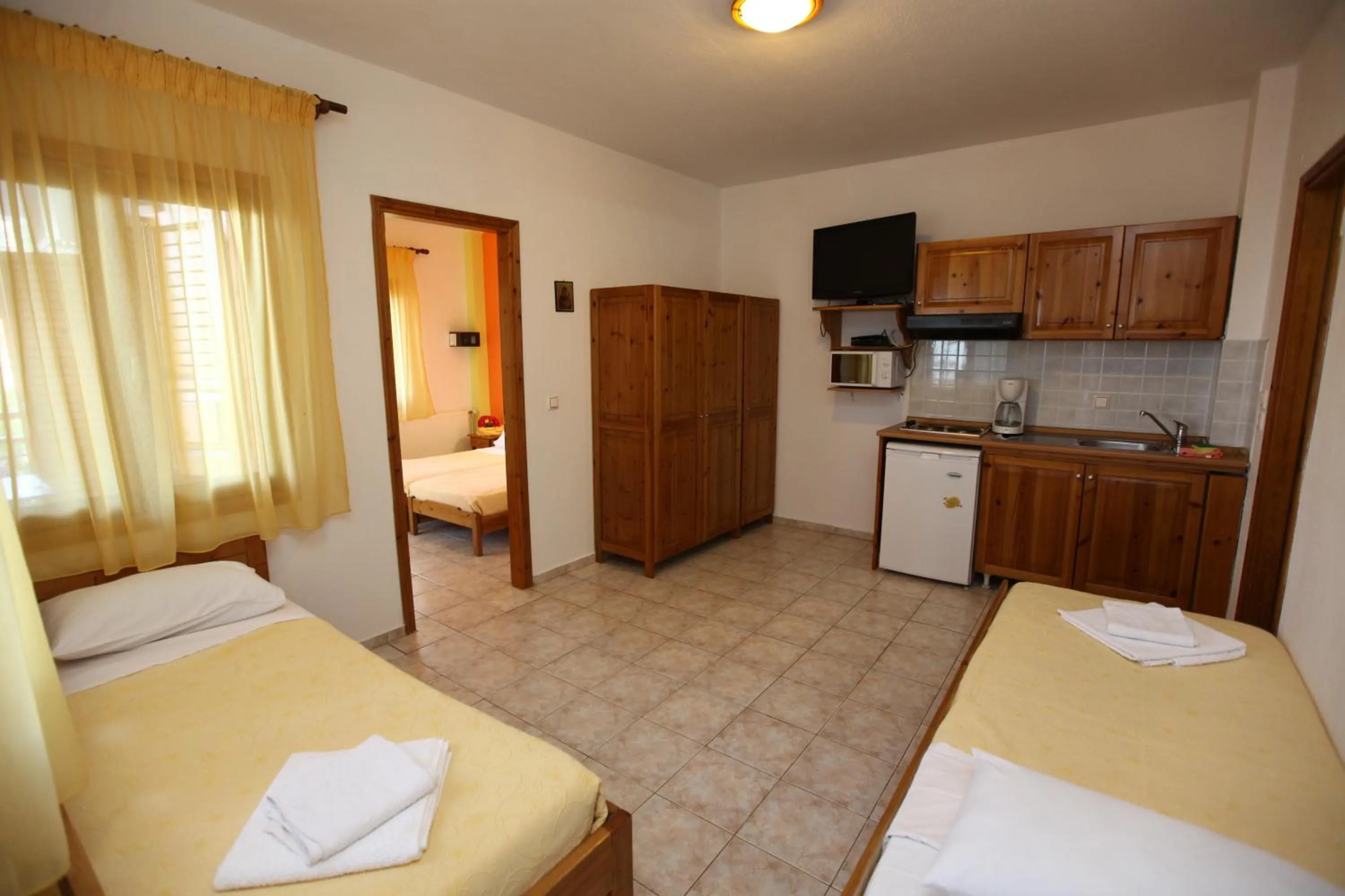 Bed in Nama Apartments