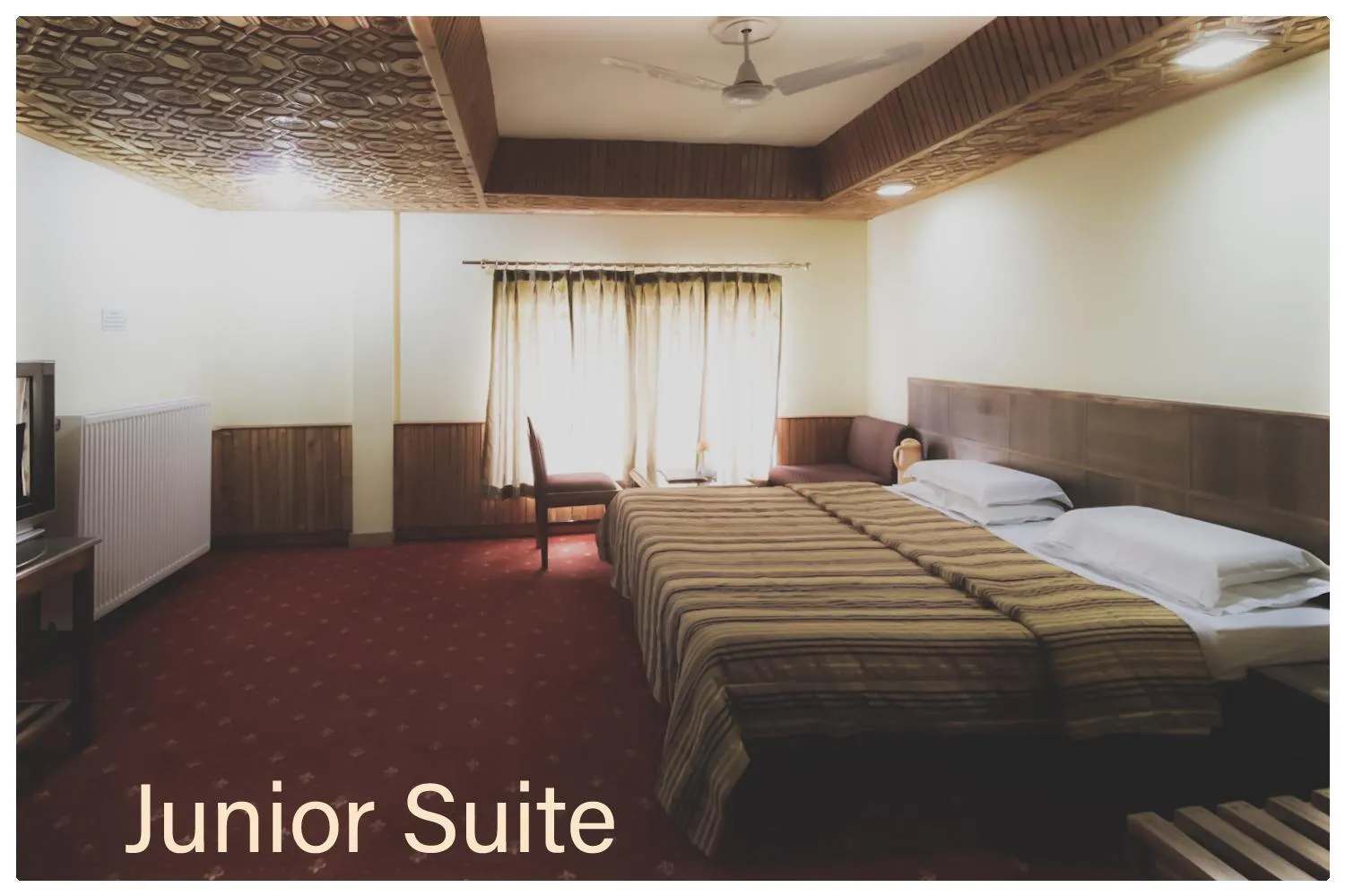 Bed in Vardaan Hotels - PatniTop
