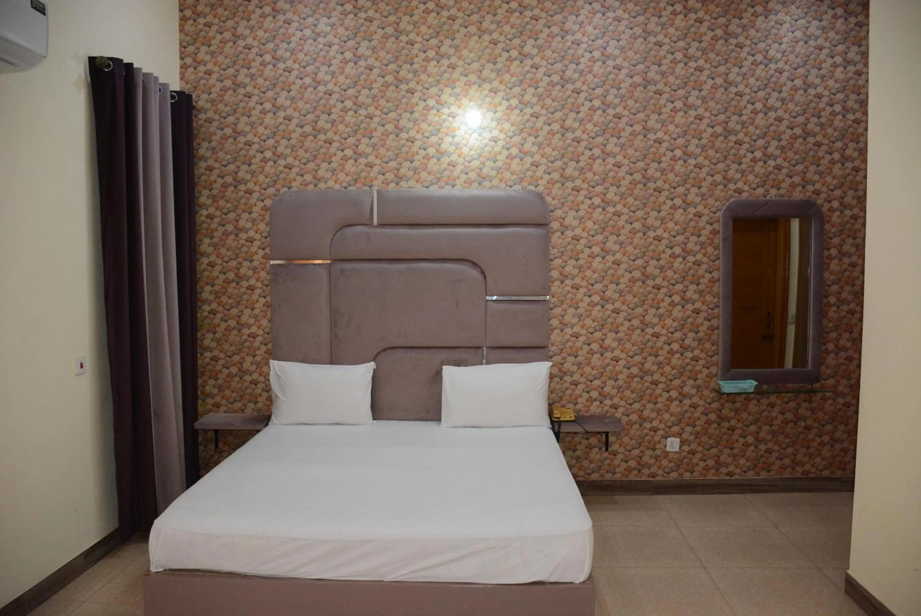 Photo of the whole room, Bed in Hotel The Taj Multan