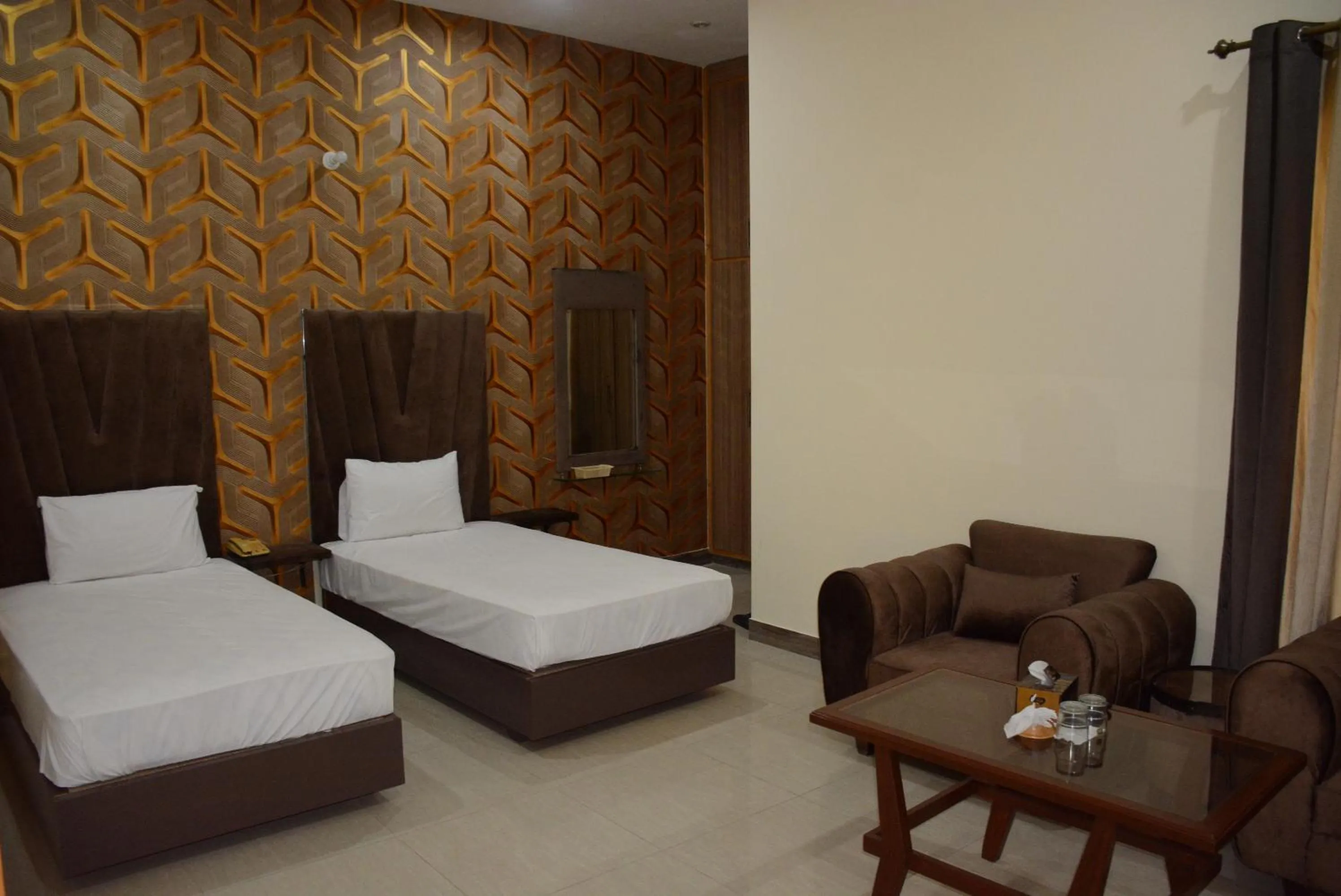 Photo of the whole room, Bed in Hotel The Taj Multan