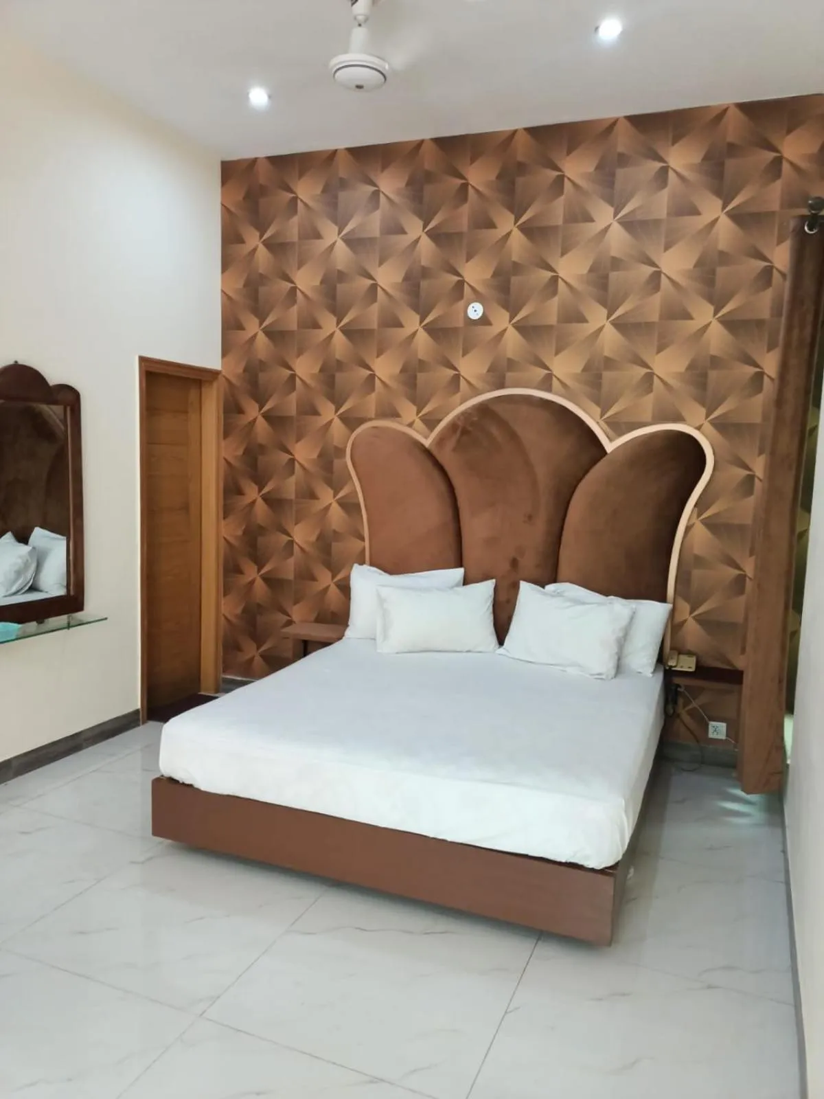 Photo of the whole room, Bed in Hotel The Taj Multan