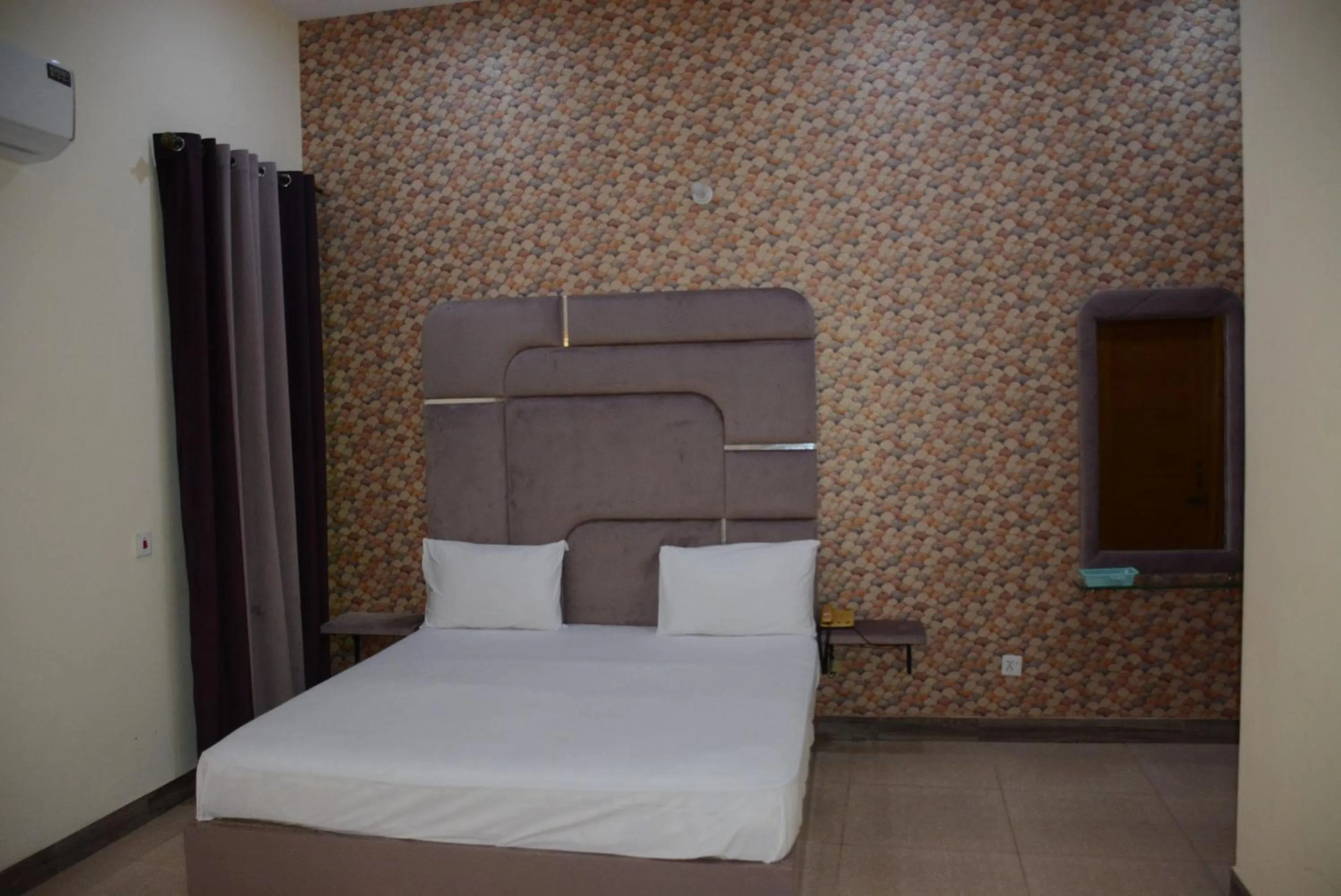 Photo of the whole room, Bed in Hotel The Taj Multan