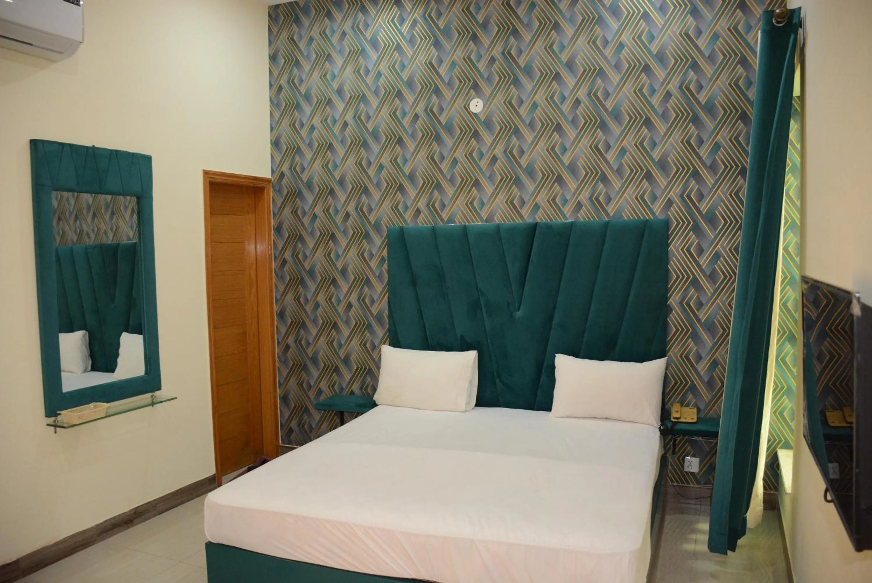 Photo of the whole room, Bed in Hotel The Taj Multan