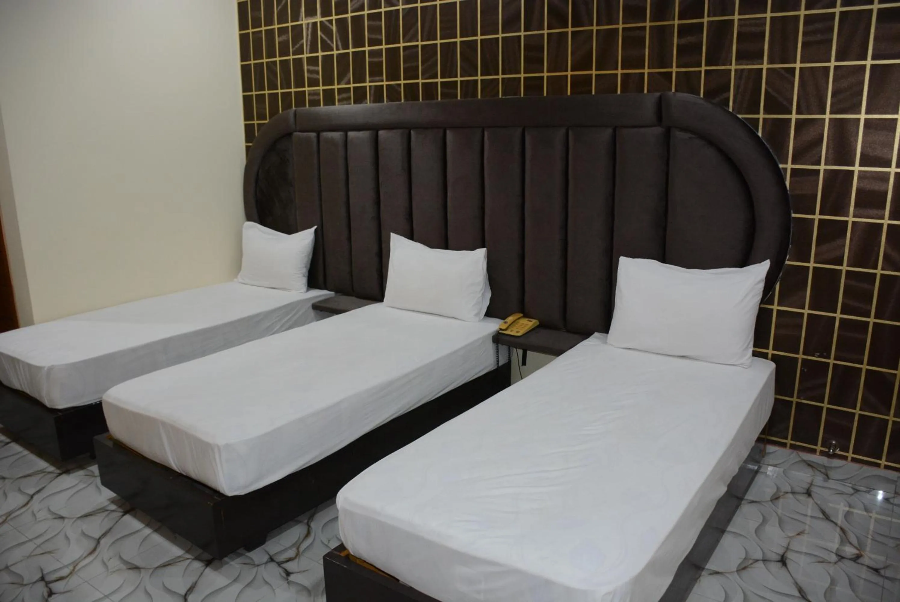 Photo of the whole room, Bed in Hotel The Taj Multan