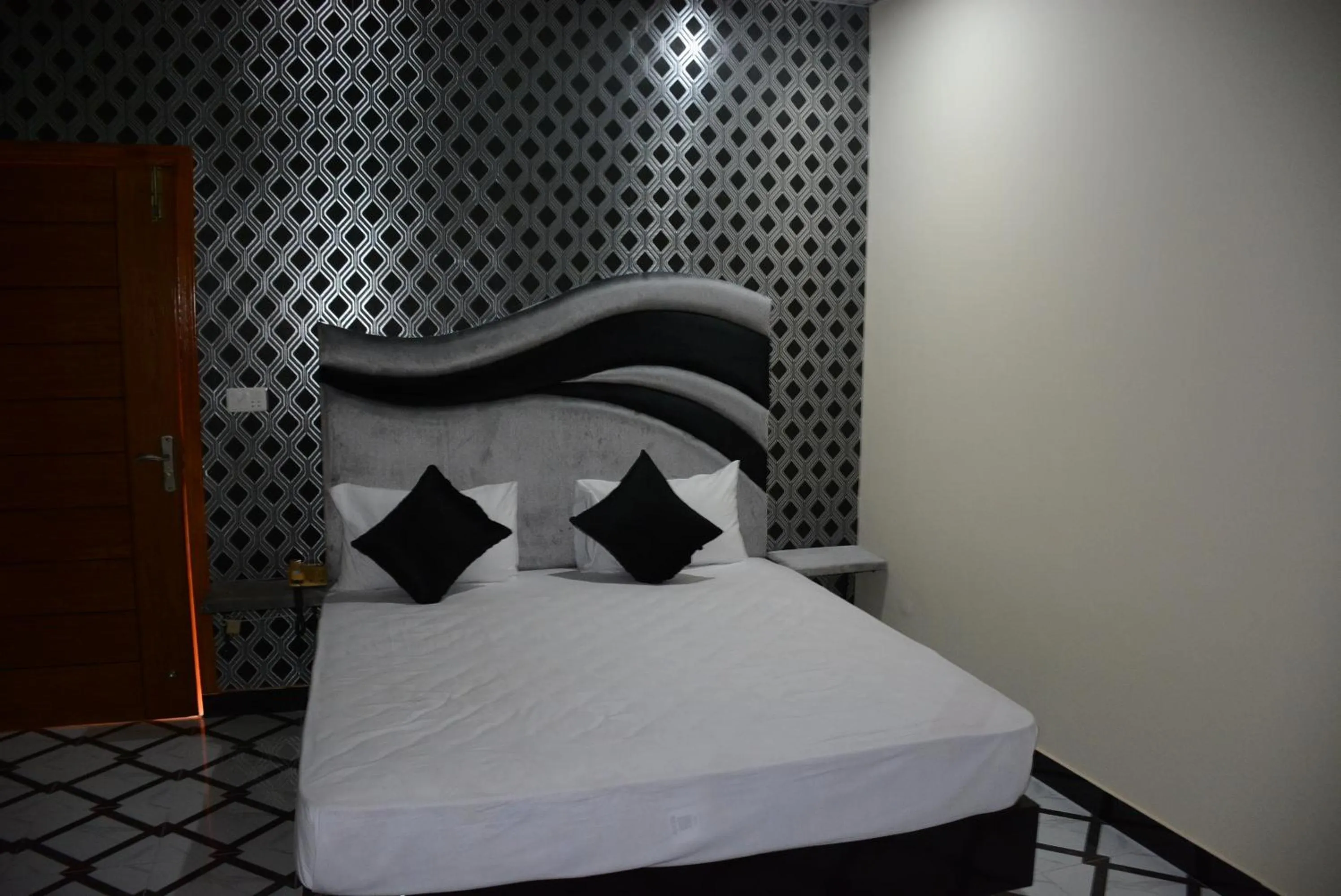 Photo of the whole room, Bed in Hotel The Taj Multan