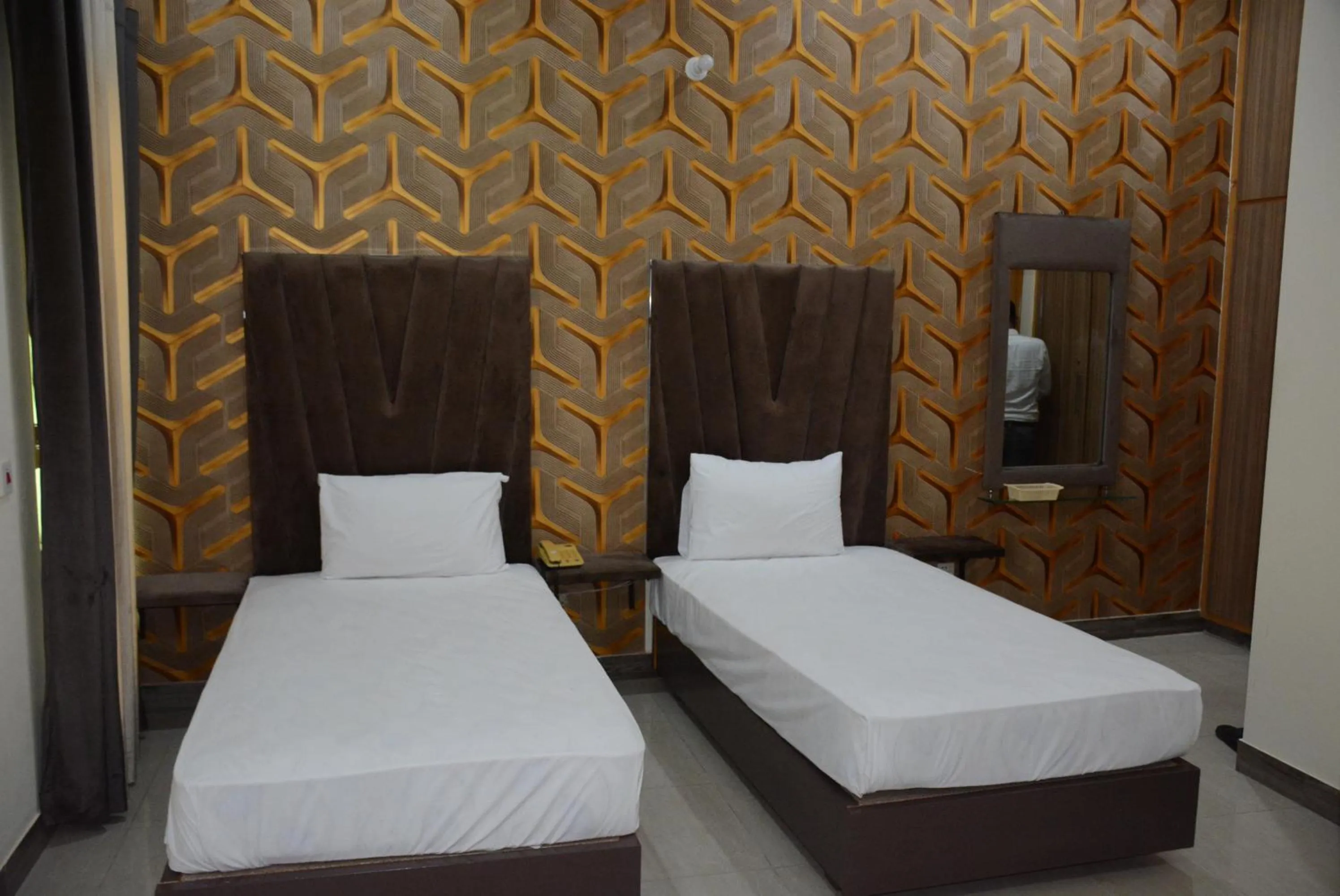 Photo of the whole room, Bed in Hotel The Taj Multan