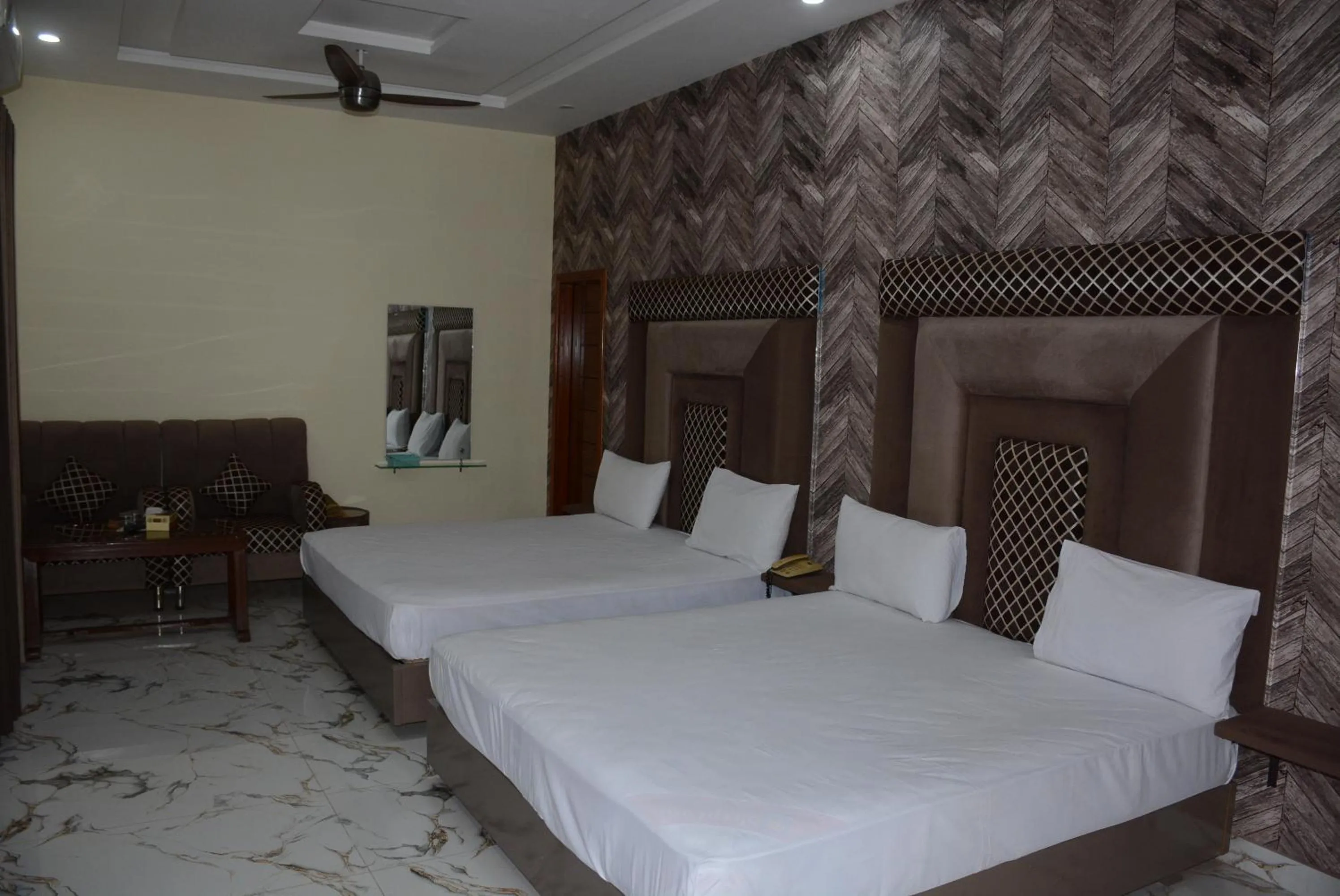 Photo of the whole room, Bed in Hotel The Taj Multan