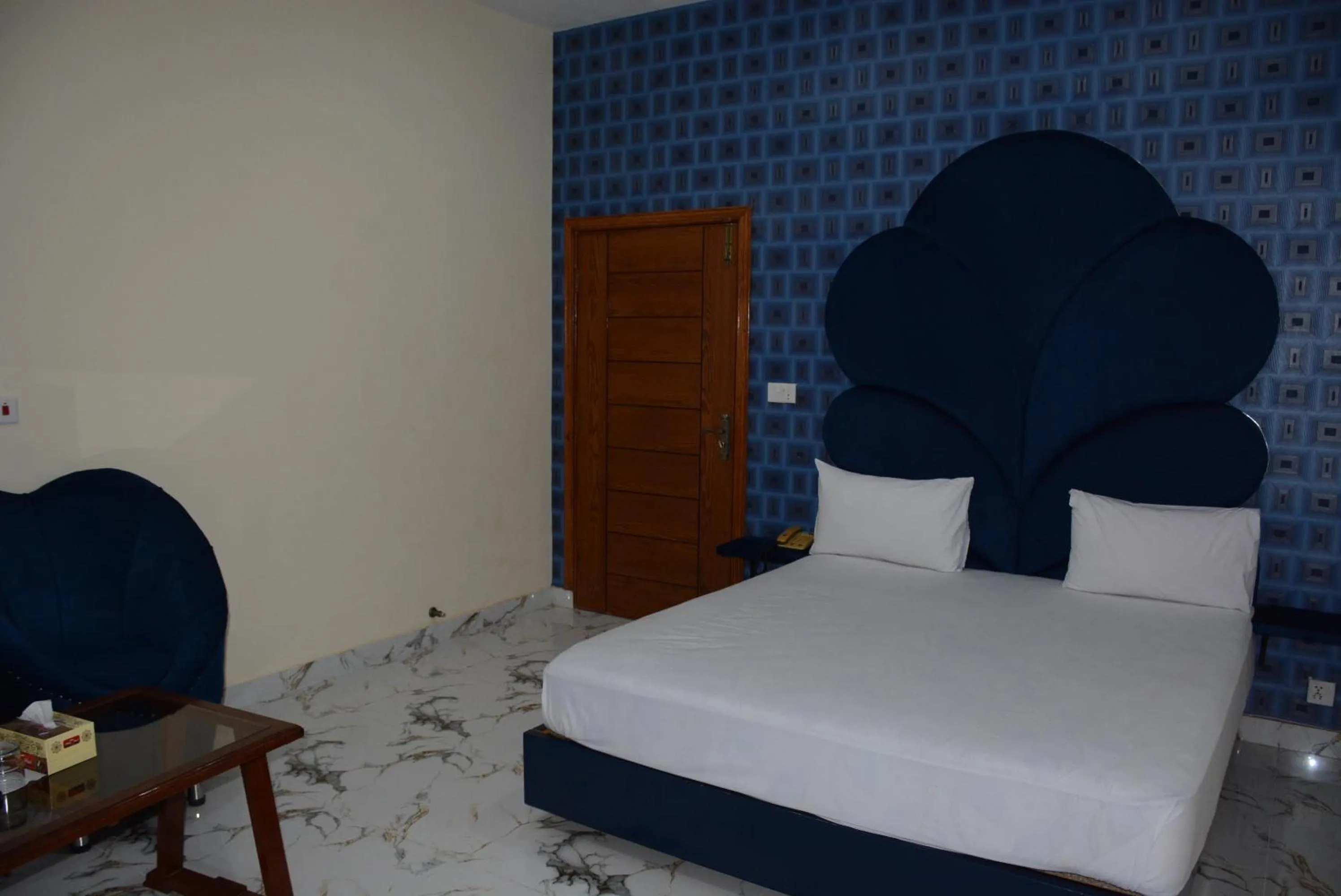Photo of the whole room, Bed in Hotel The Taj Multan