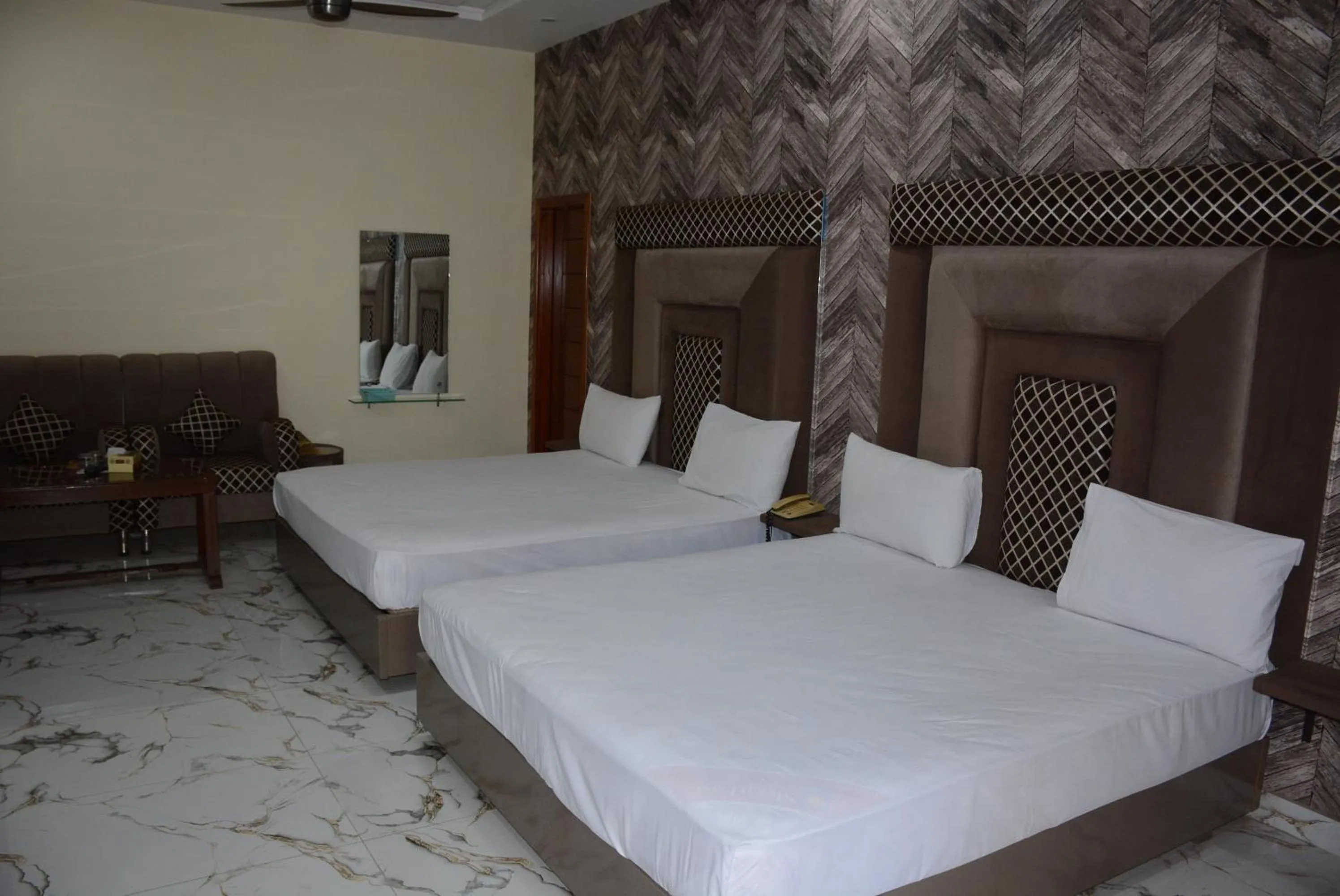 Photo of the whole room, Bed in Hotel The Taj Multan