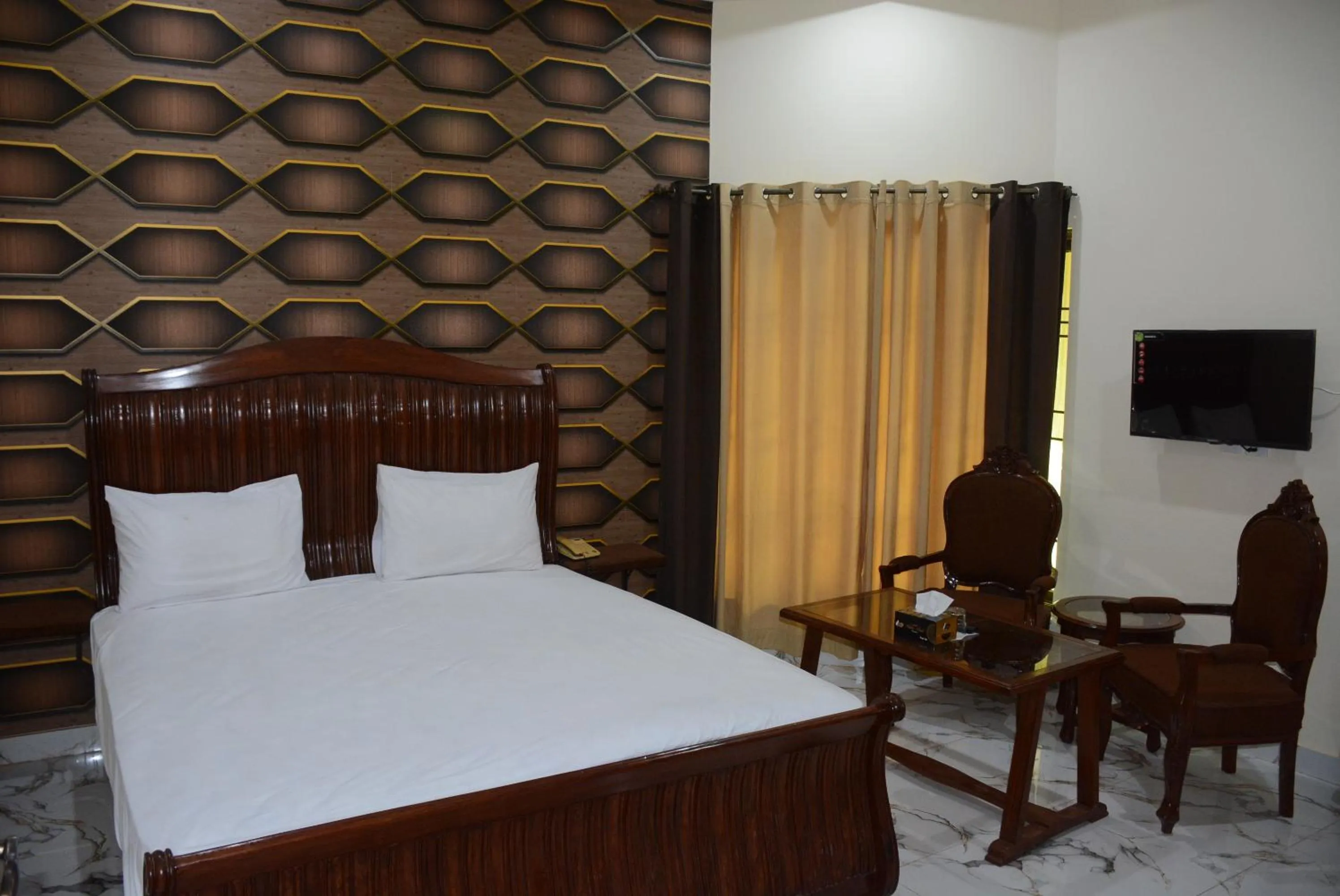 Photo of the whole room, Bed in Hotel The Taj Multan