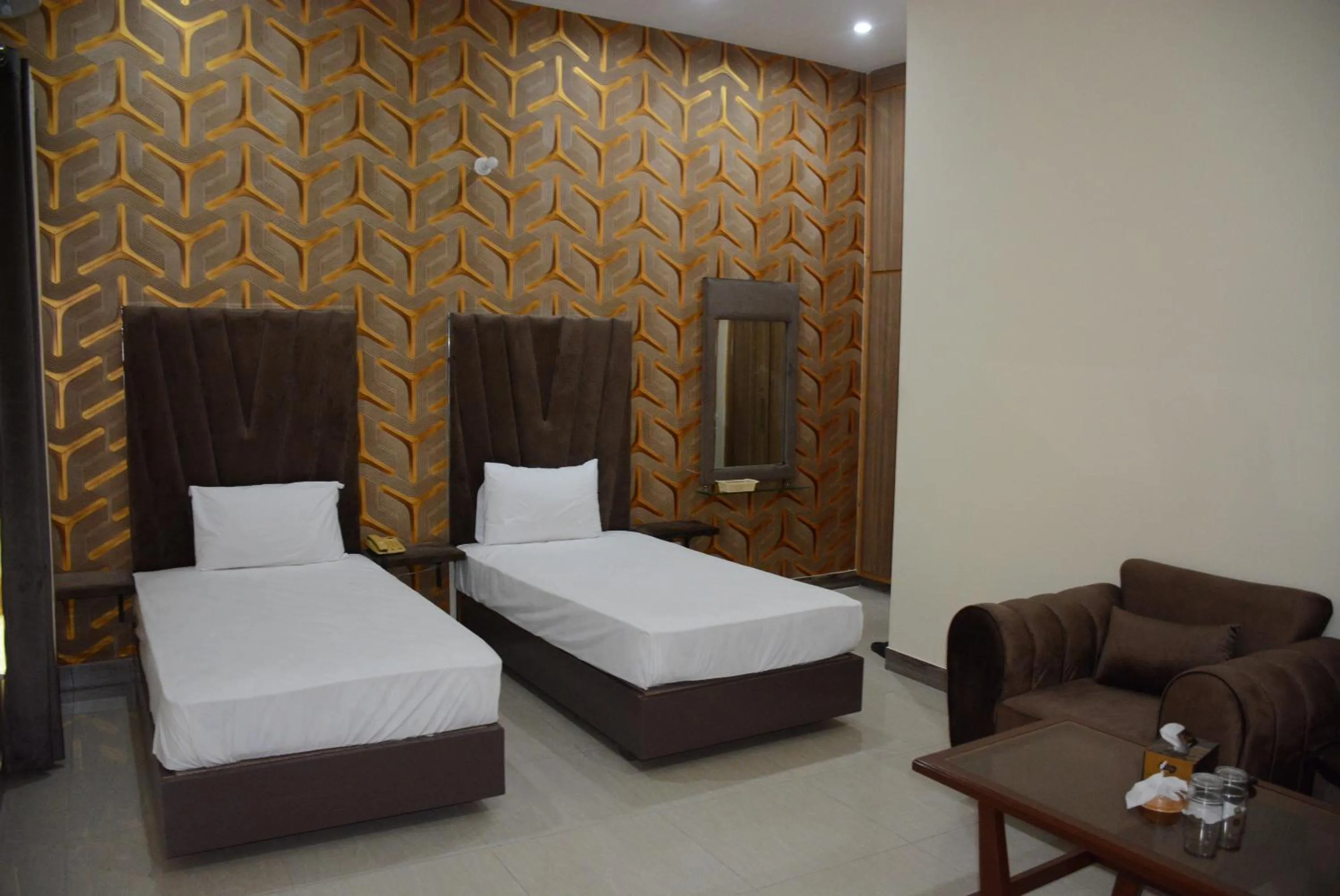 Photo of the whole room, Bed in Hotel The Taj Multan