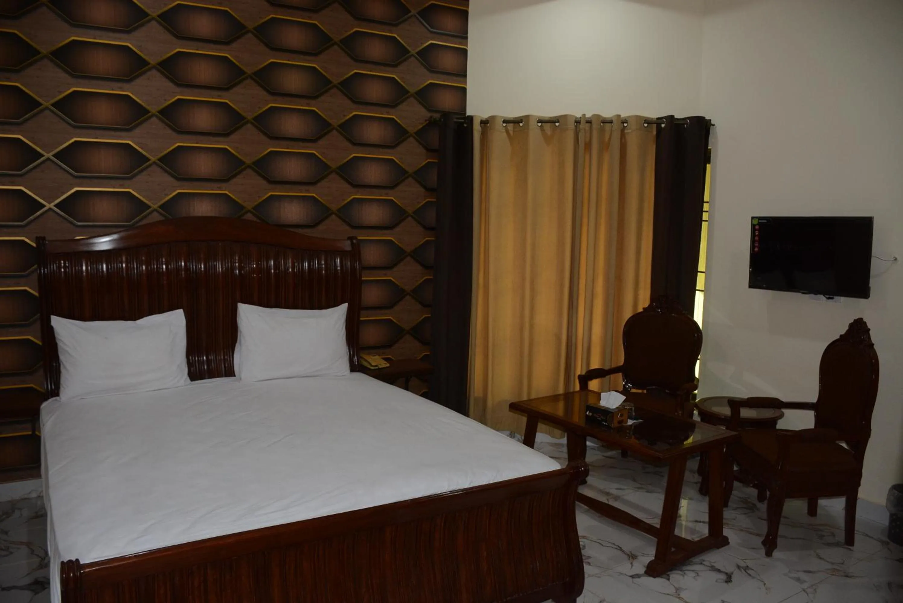Photo of the whole room, Bed in Hotel The Taj Multan