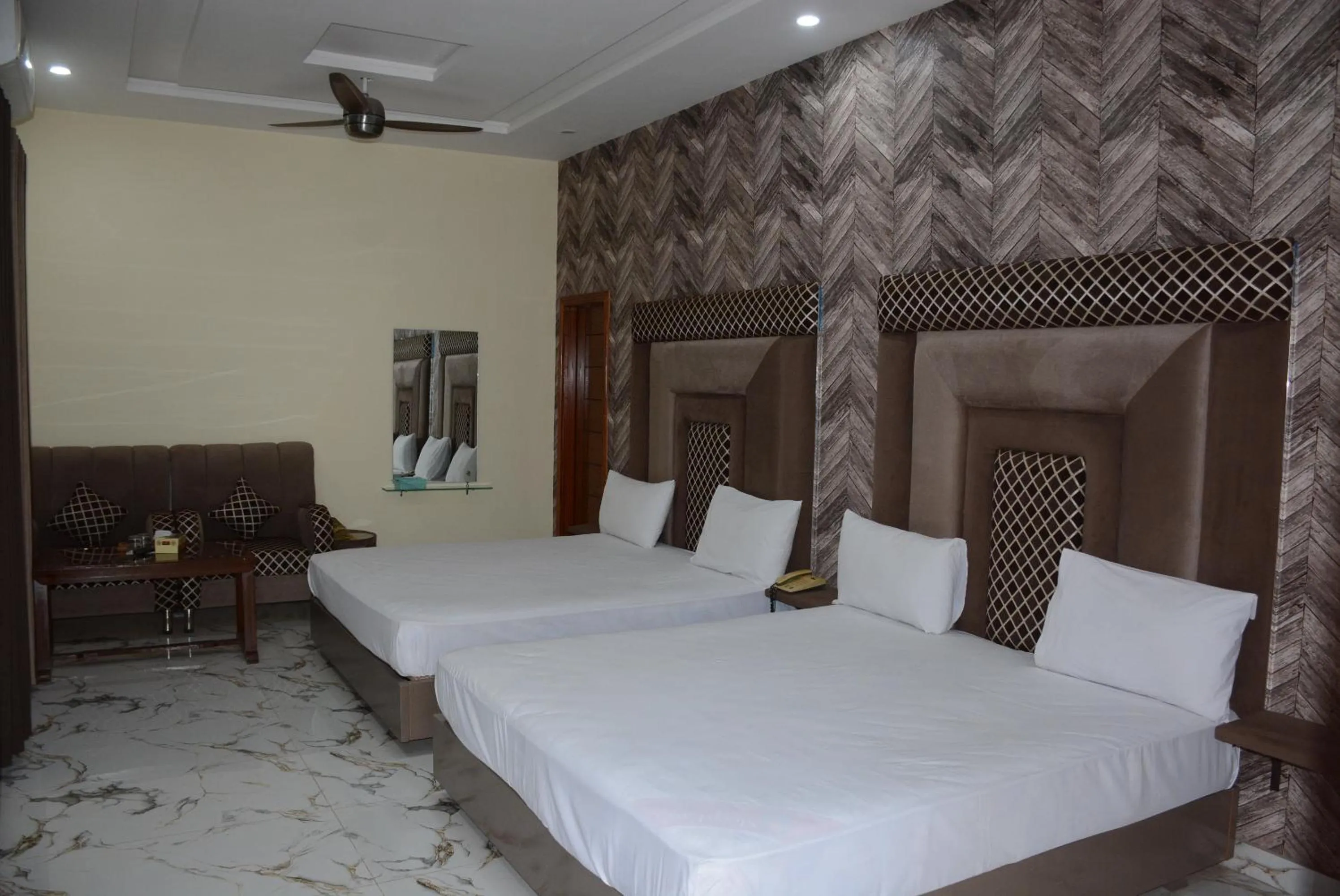 Photo of the whole room, Bed in Hotel The Taj Multan