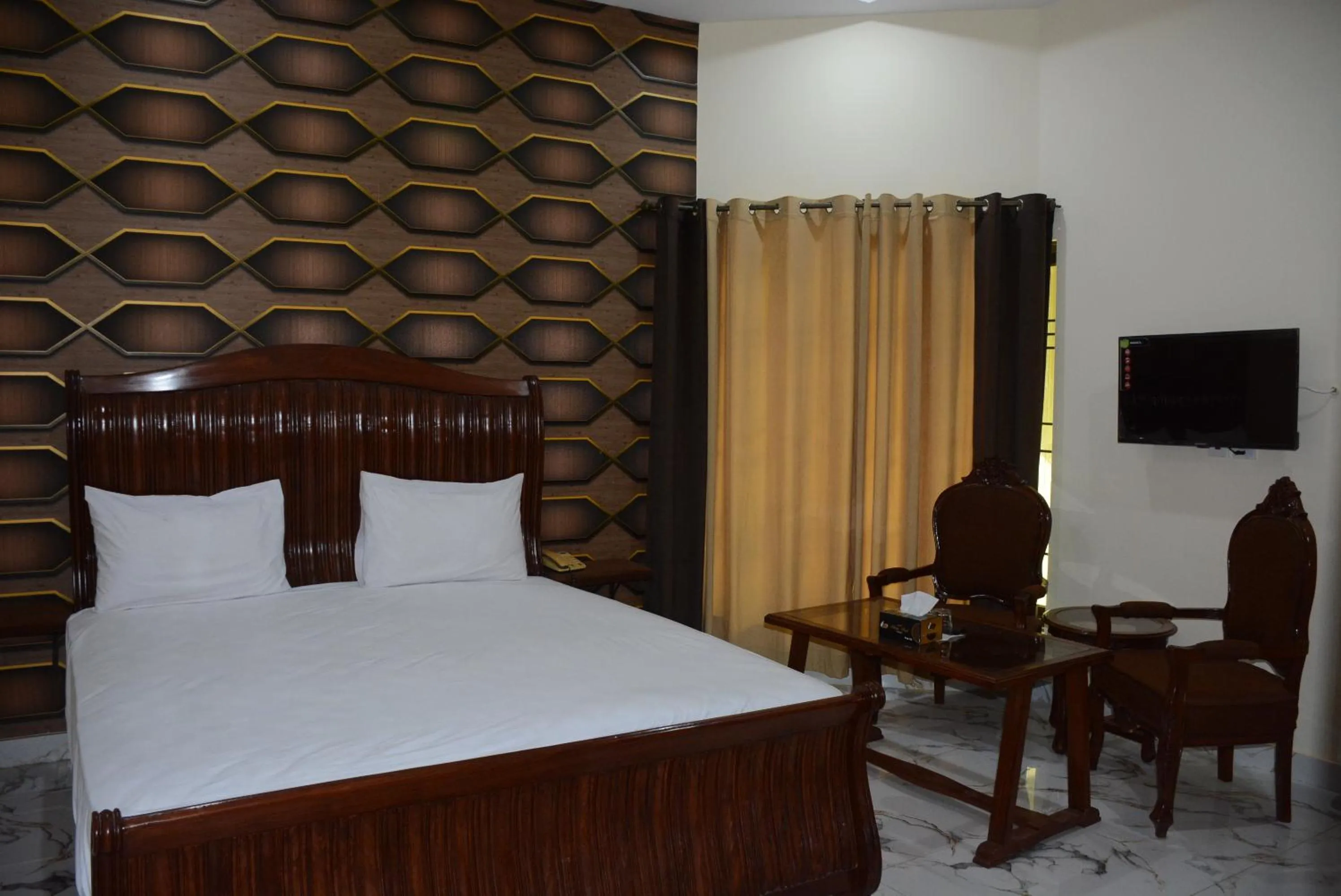 Photo of the whole room, Bed in Hotel The Taj Multan