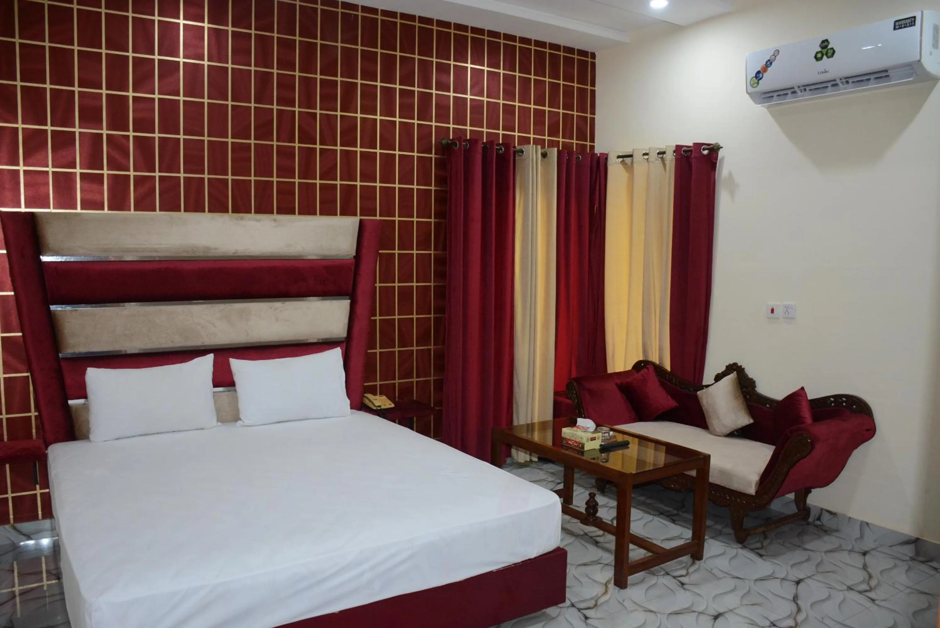 Photo of the whole room, Bed in Hotel The Taj Multan