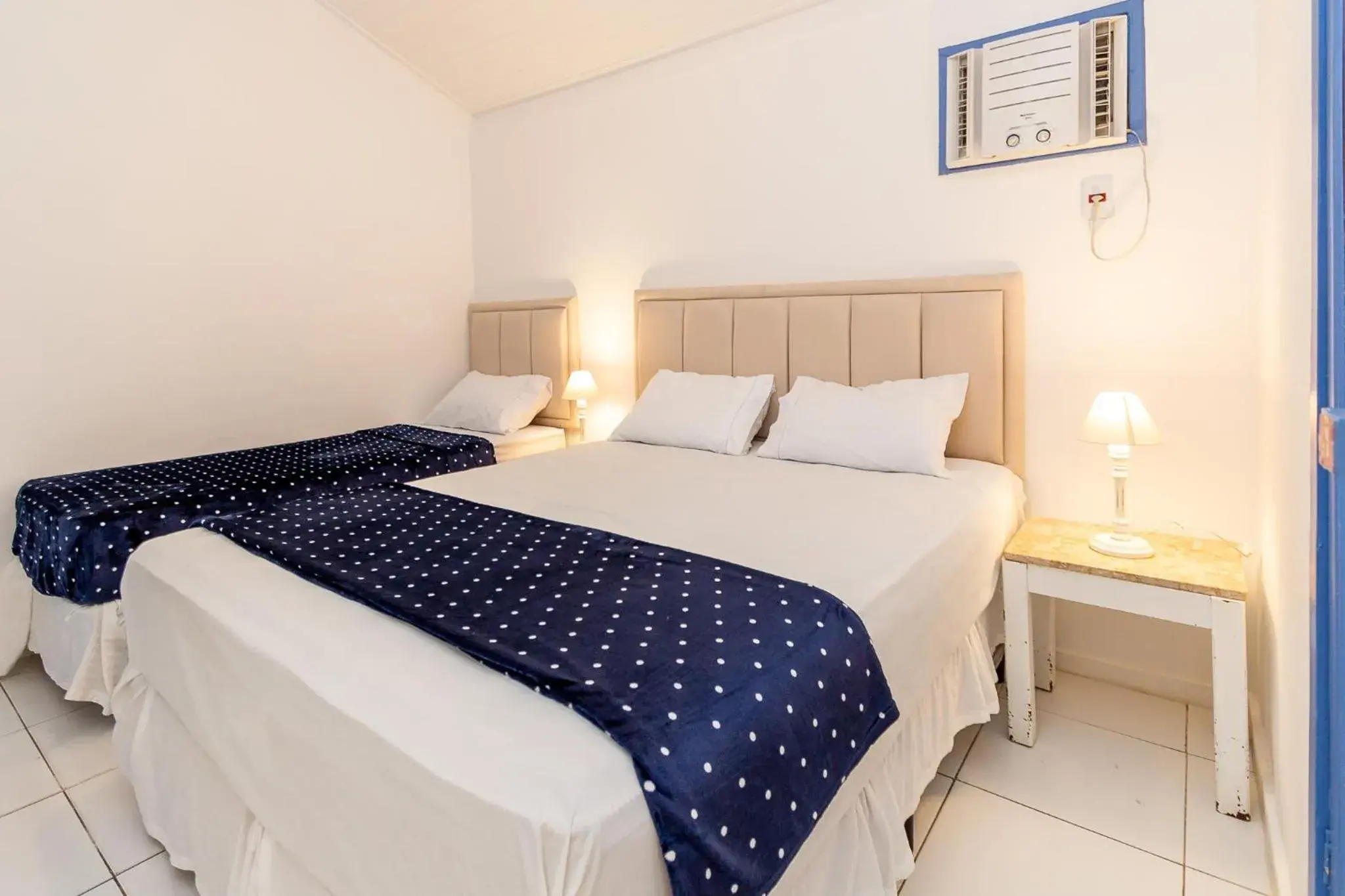 Triple Room with Balcony in Pousada Vila Capri Triple Room with Balcony in Pousada Vila Capri