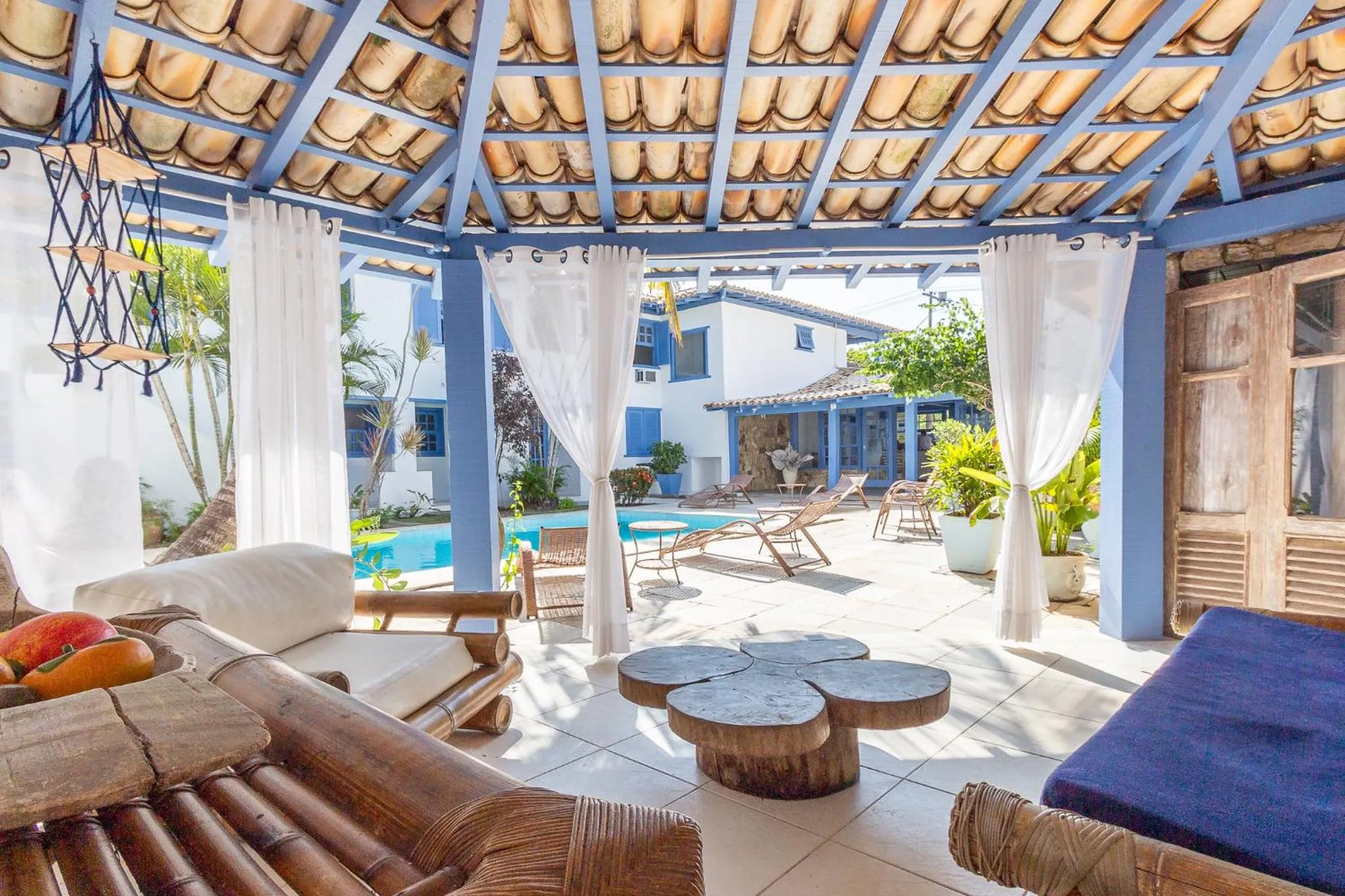 Communal lounge/ TV room in Pousada Vila Capri