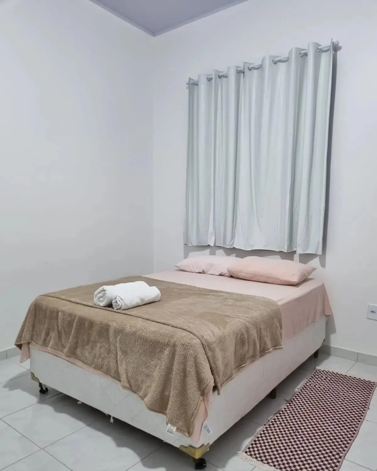 Bed in Pousada Talismã