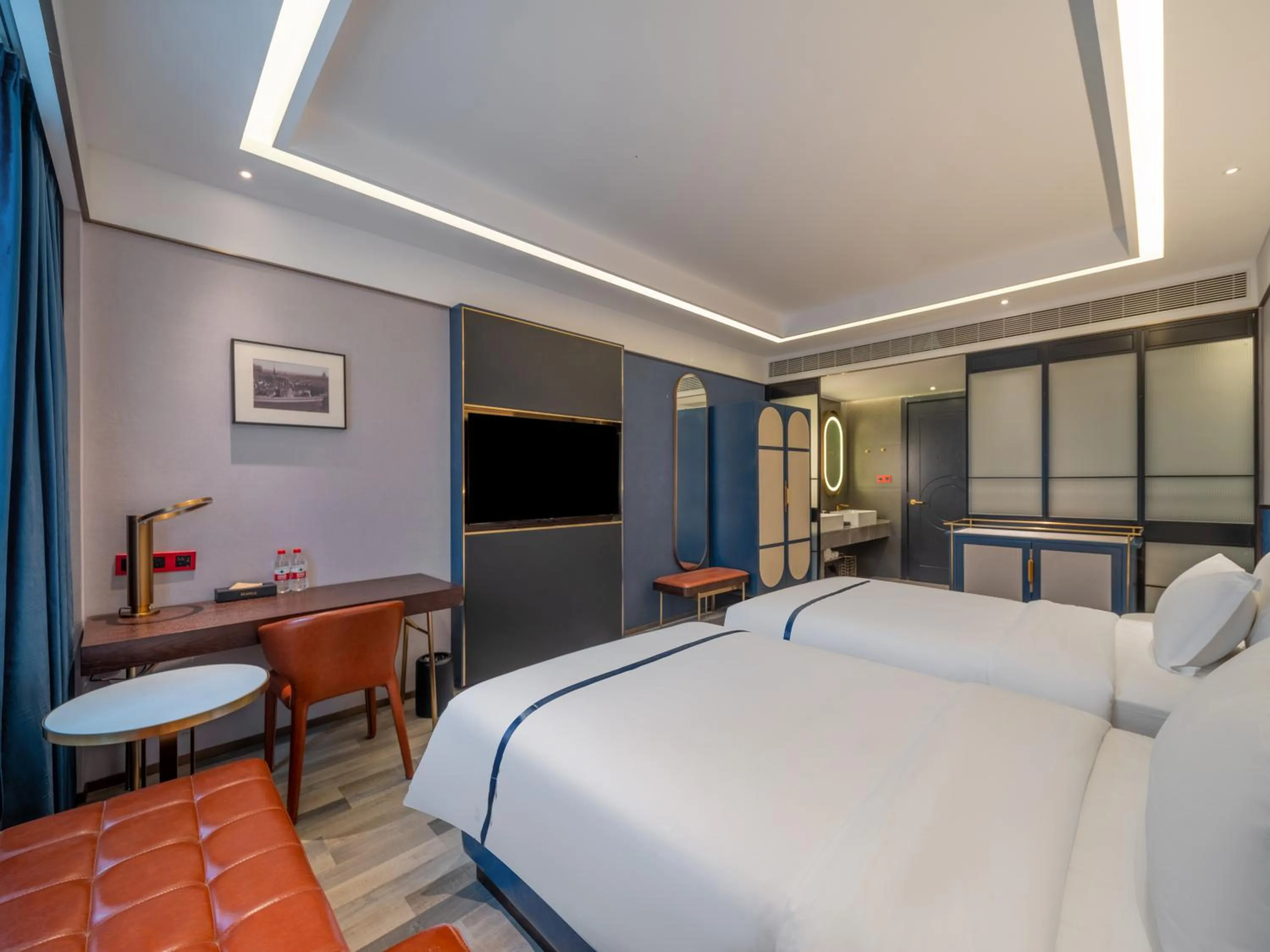 Seating area, Bed in 西安钟楼枫渡酒店永兴坊地铁站店