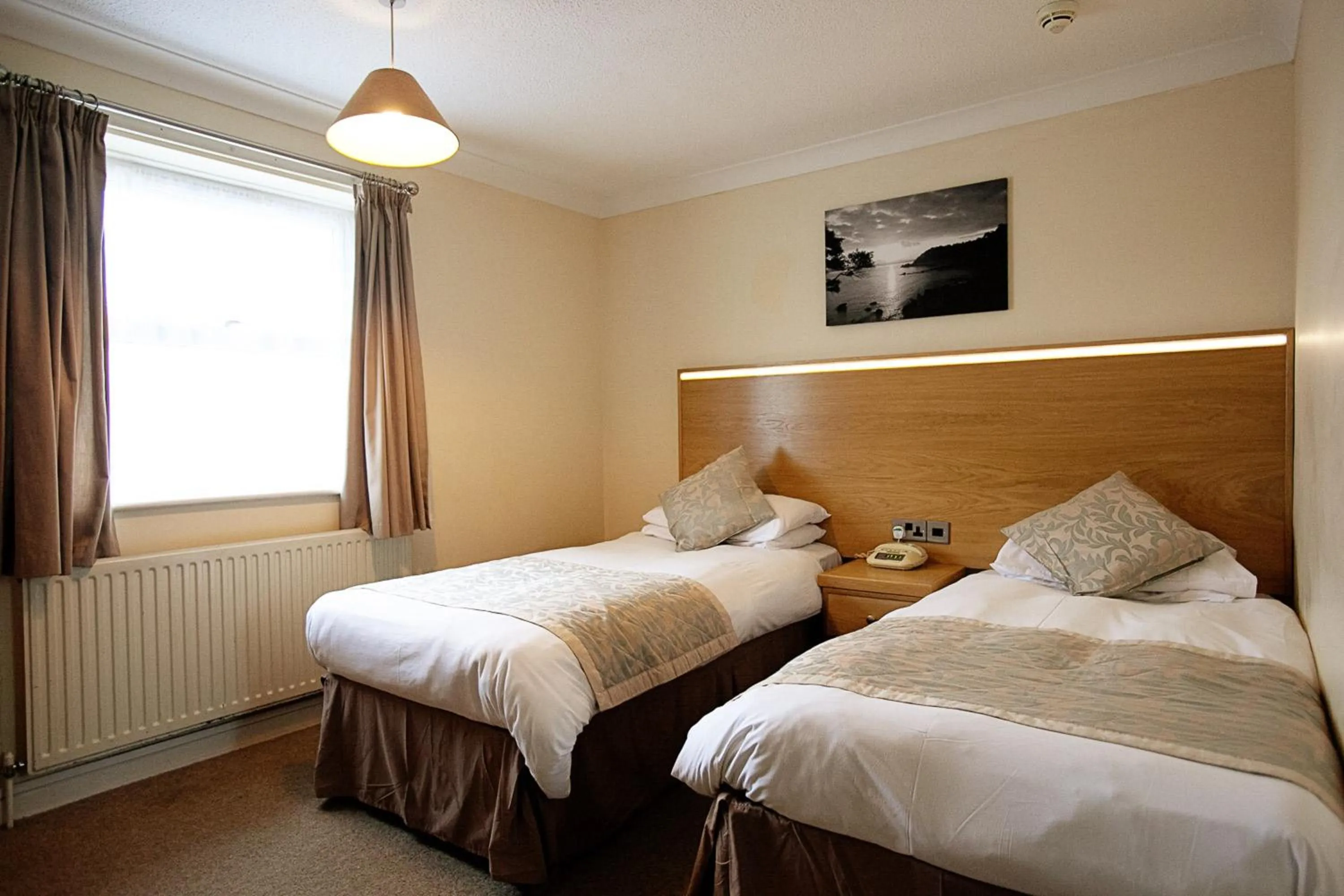 Bed in Anchorage Hotel & Spa