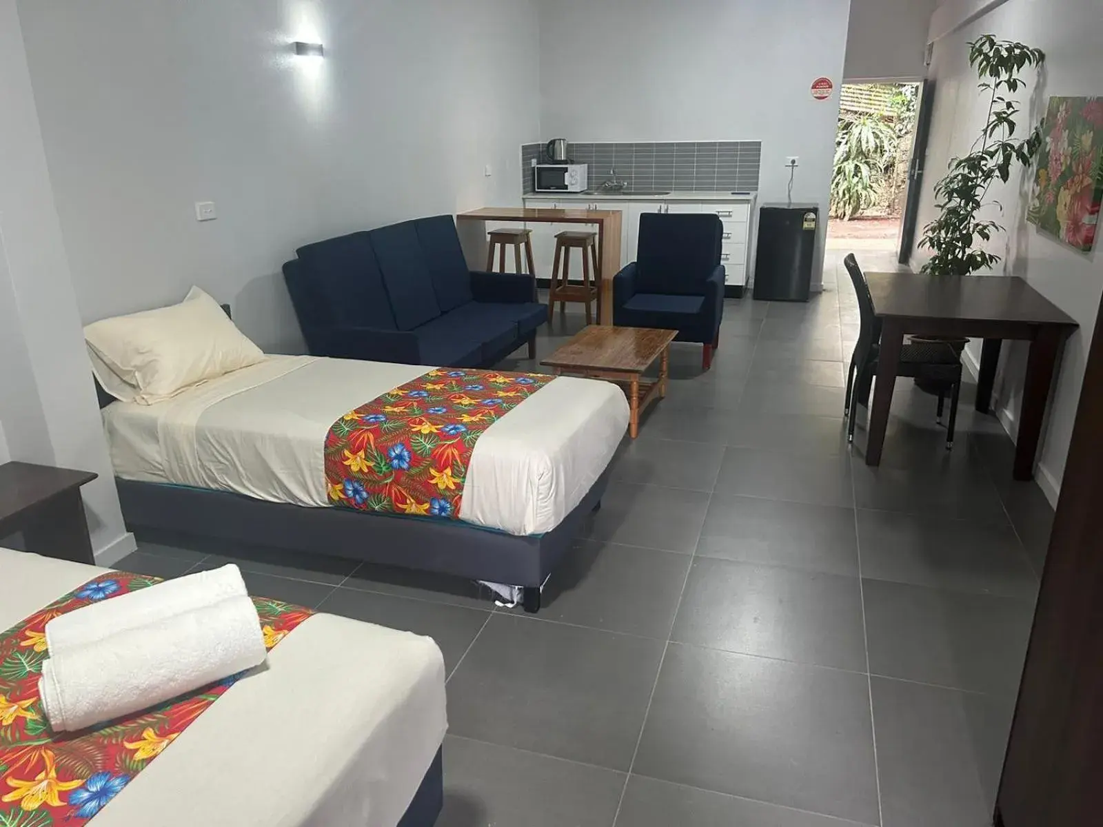 Triple Room with Garden View in Yatulau Hotel and Conference Triple Room with Garden View in Yatulau Hotel and Conference