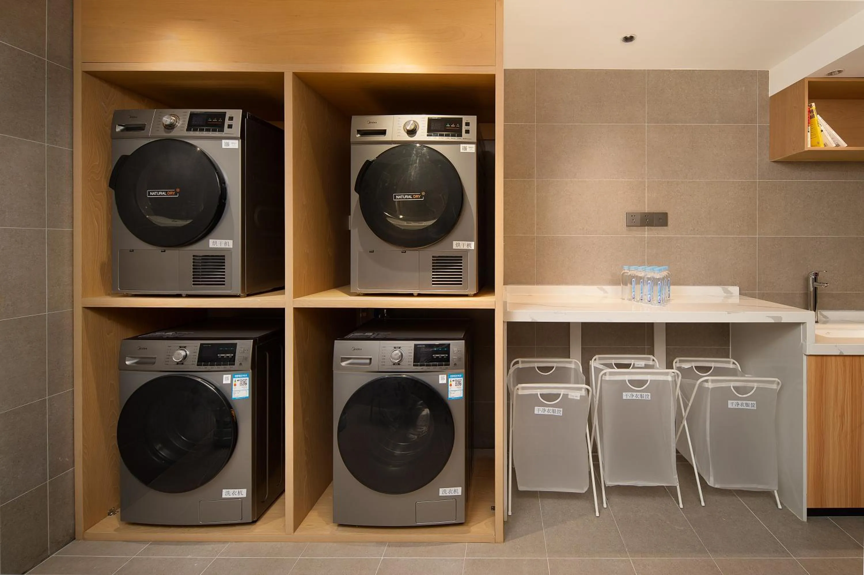 washing machine in Langham Honor International Hotel Canton Fair Complex Branch - Free Shuttle to Canton Fair Complex During Canton Fair Period & Free Mini Bar