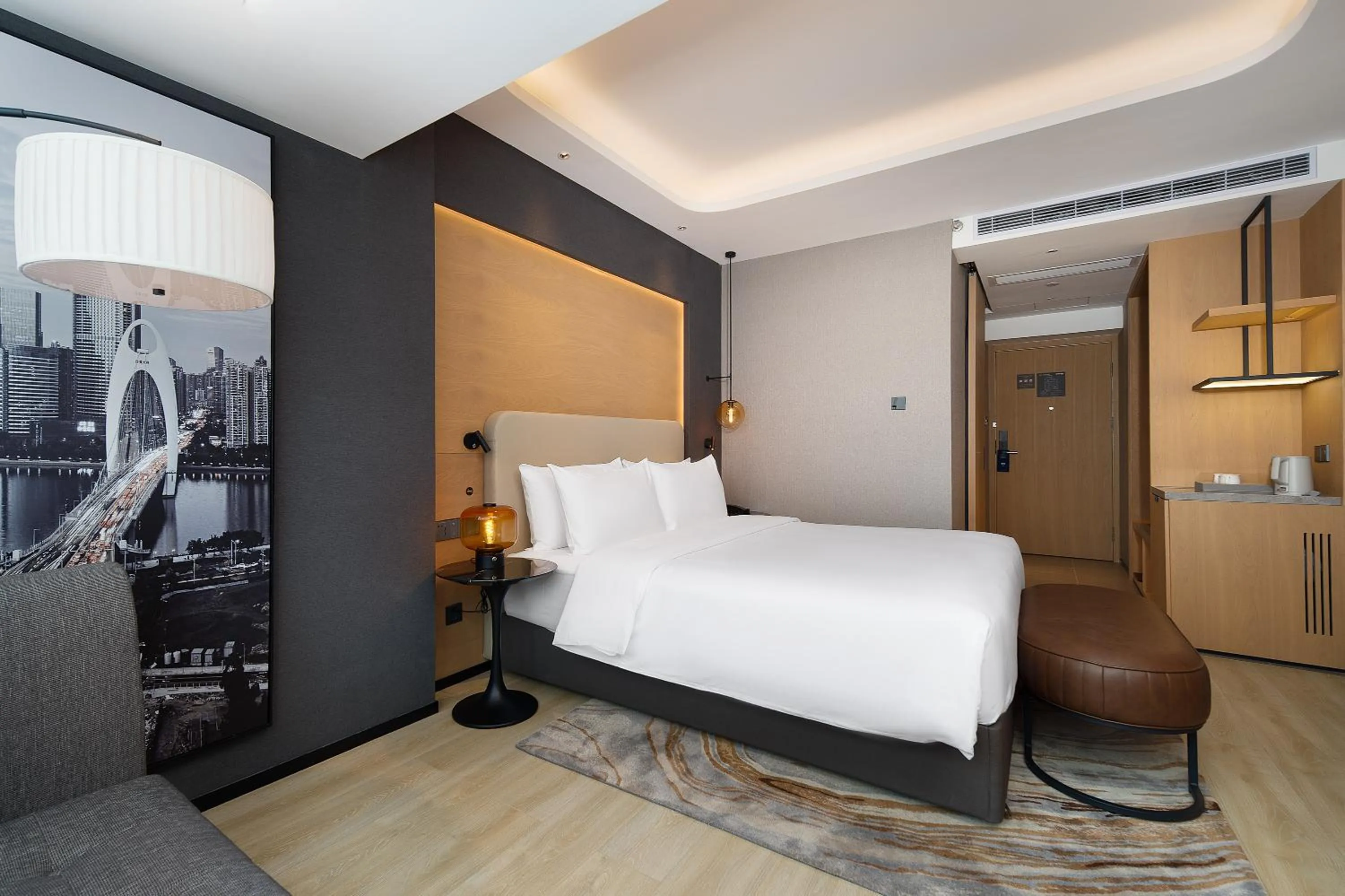 Photo of the whole room, Bed in Langham Honor International Hotel Canton Fair Complex Branch - Free Shuttle to Canton Fair Complex During Canton Fair Period & Free Mini Bar