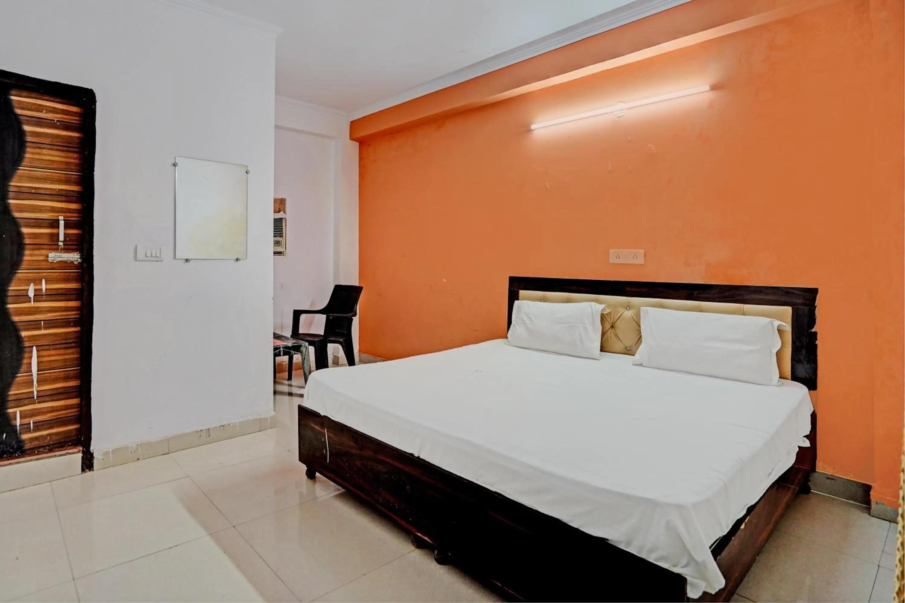 Bedroom in Hotel O Krishna Residency