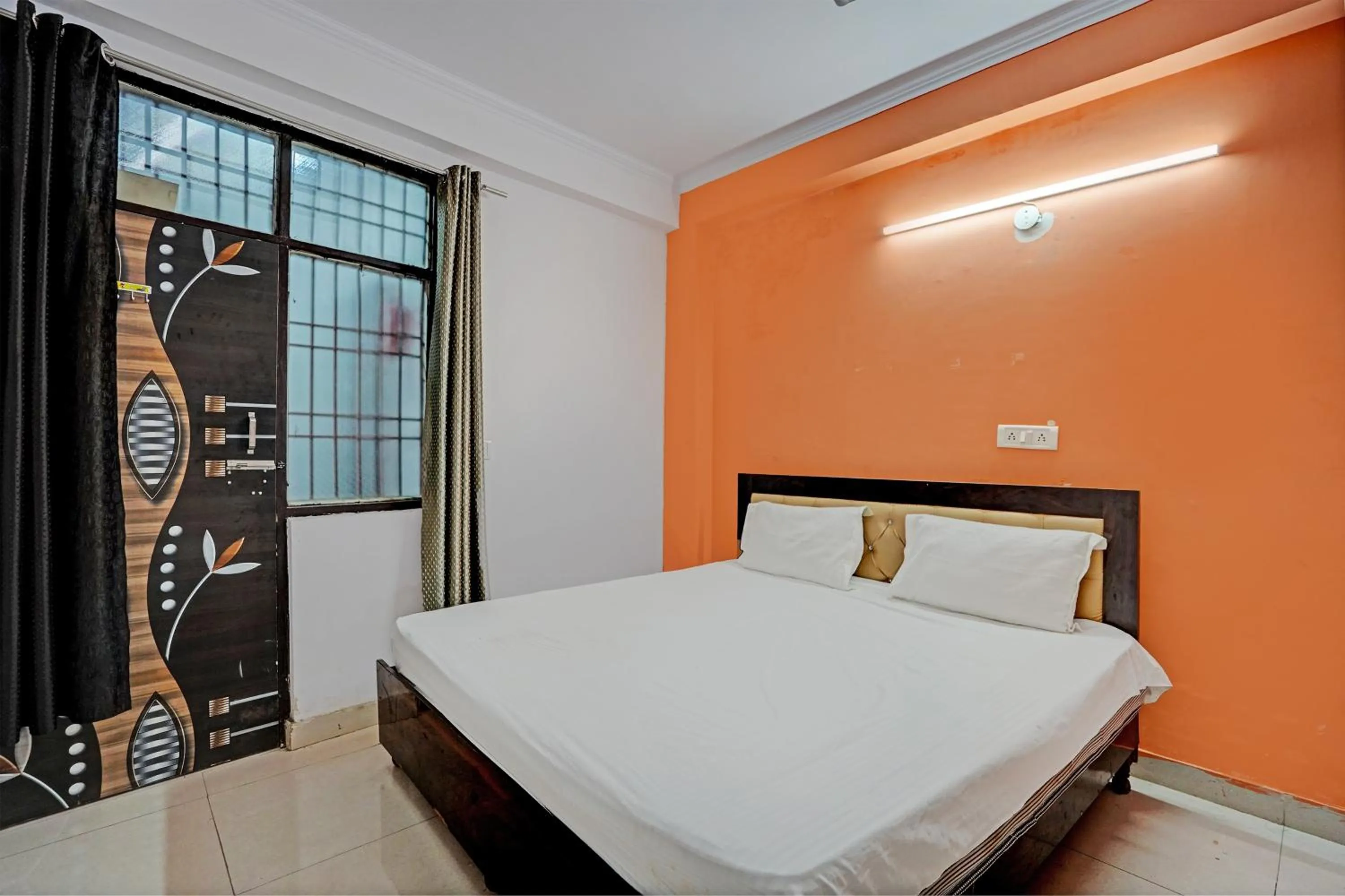 Bedroom in Hotel O Krishna Residency