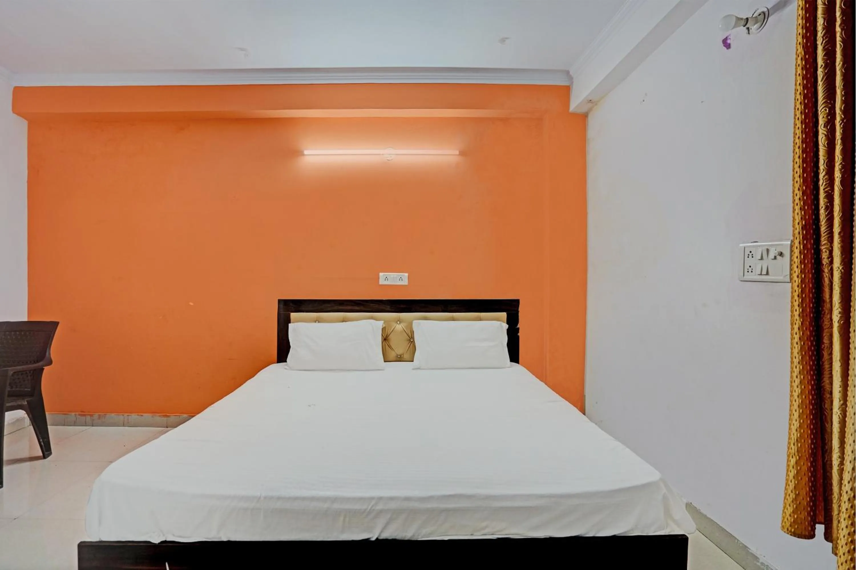 Bedroom in Hotel O Krishna Residency