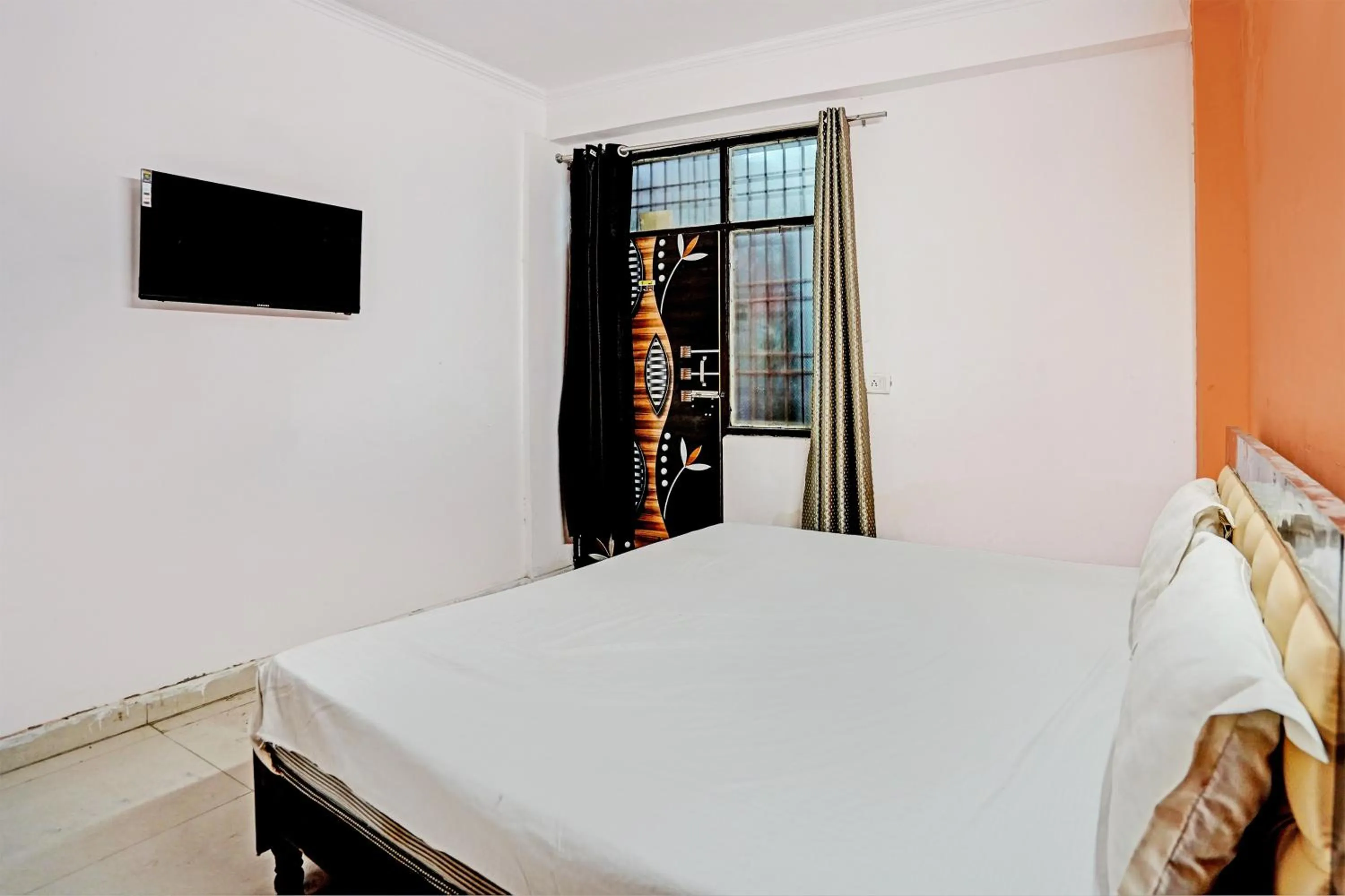 Bedroom in Hotel O Krishna Residency