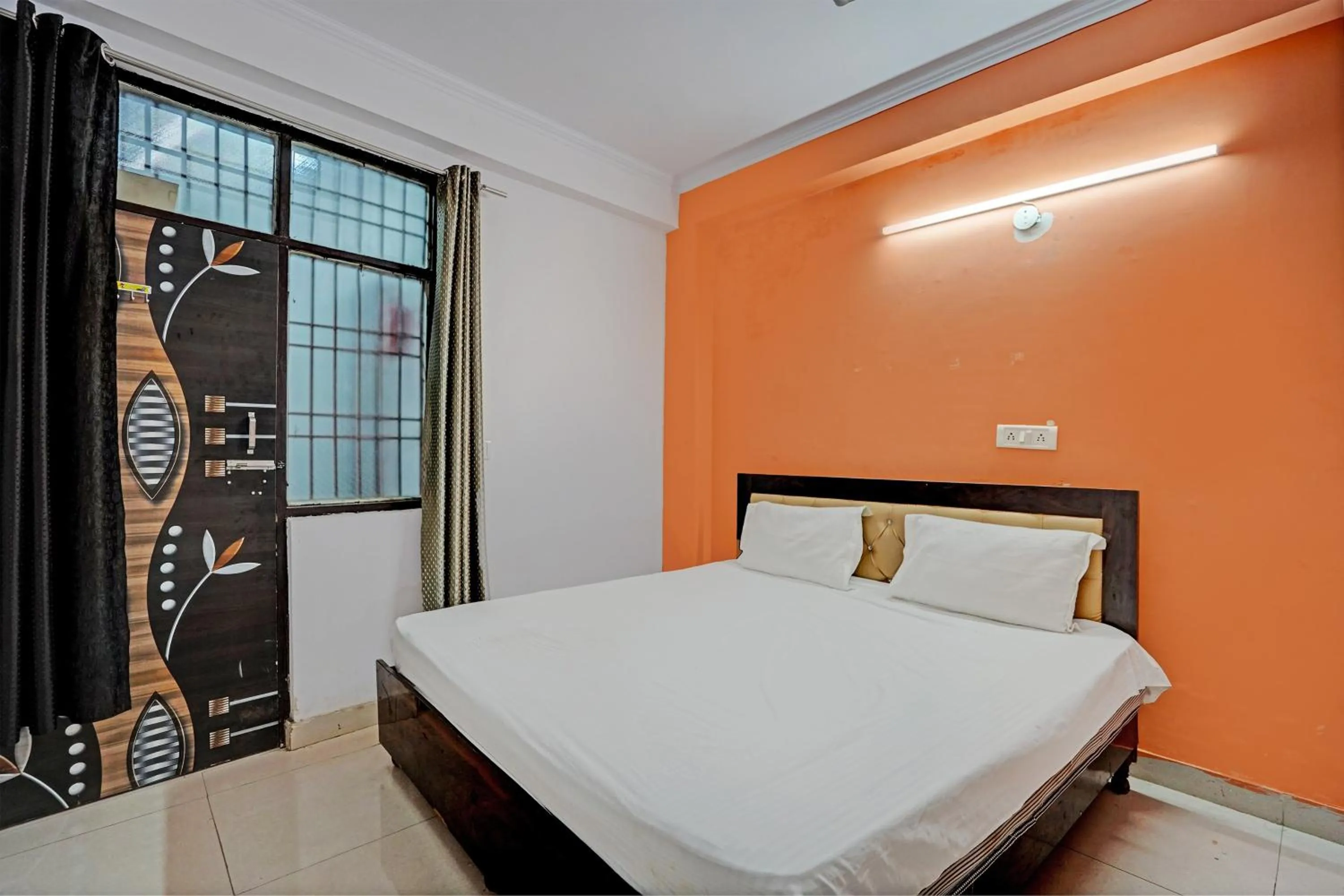 Bedroom in Hotel O Krishna Residency