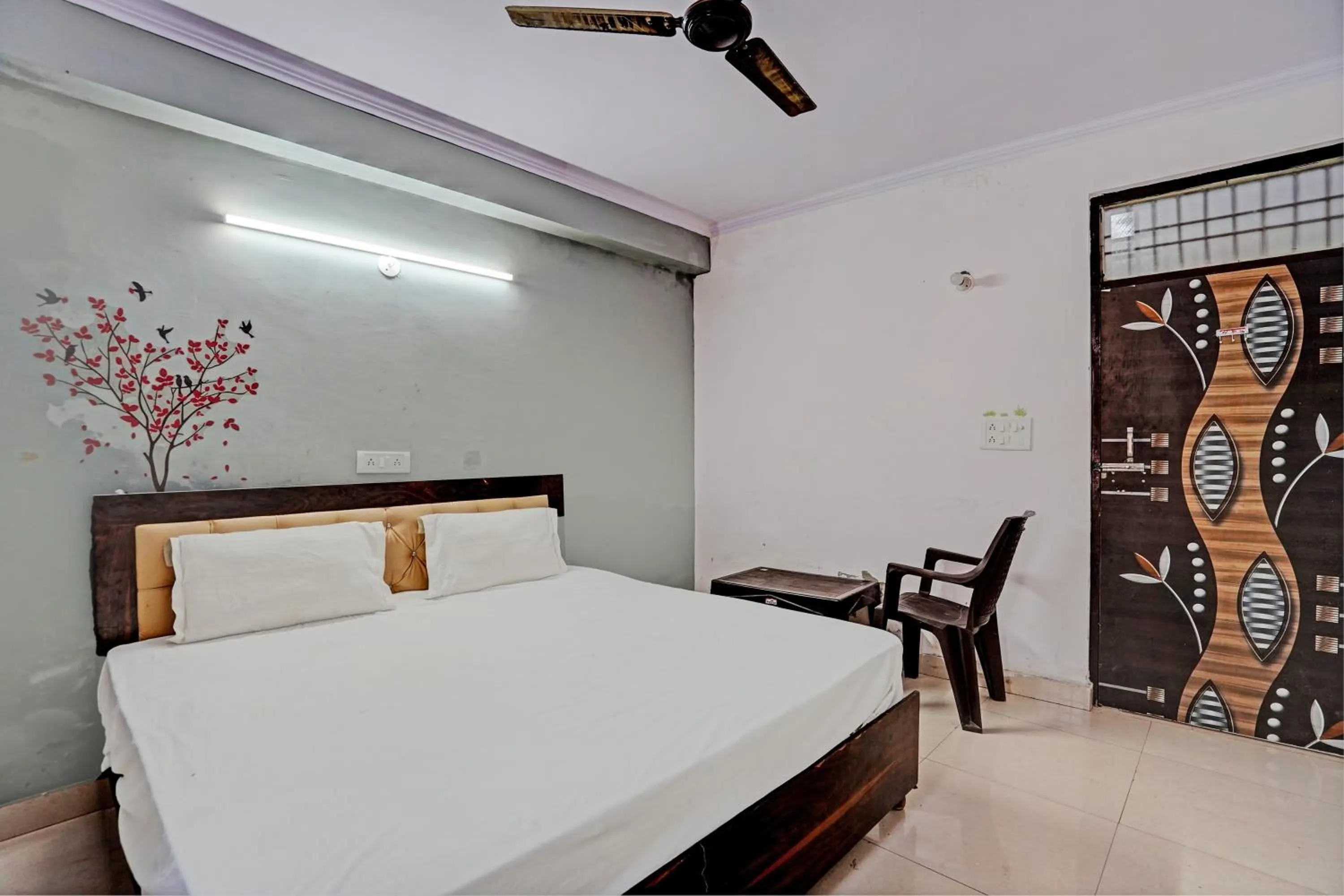 Bedroom in Hotel O Krishna Residency
