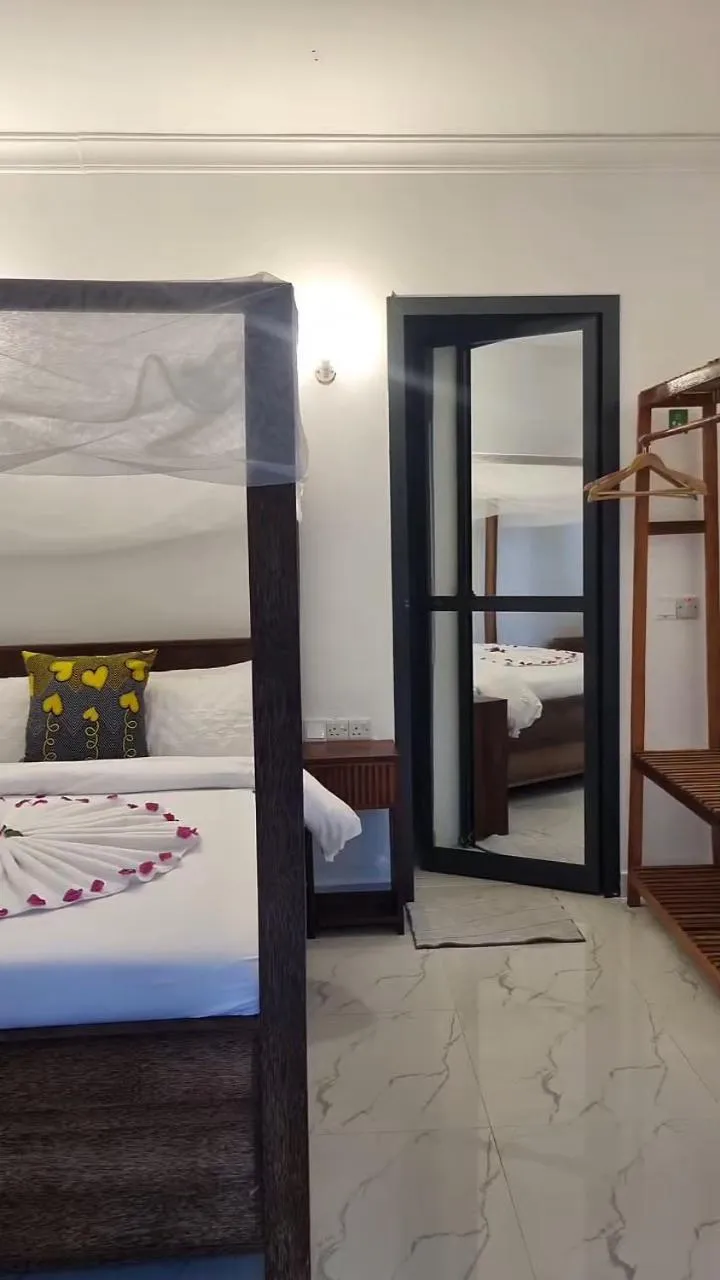 Bed in Terry's Villa Nungwi