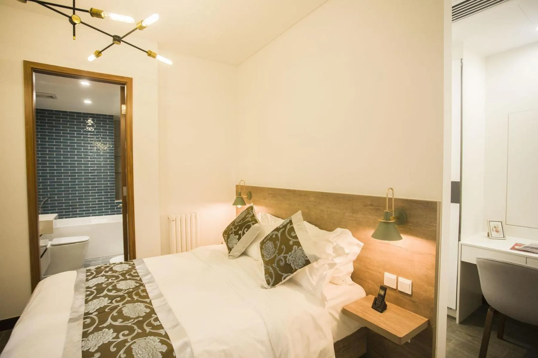 Bed in Guangyao Service Apartment Beijing Ritan