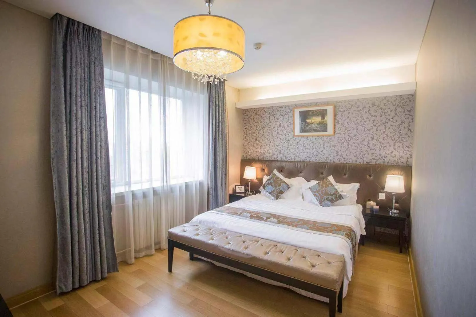 Bed in Guangyao Service Apartment Beijing Ritan